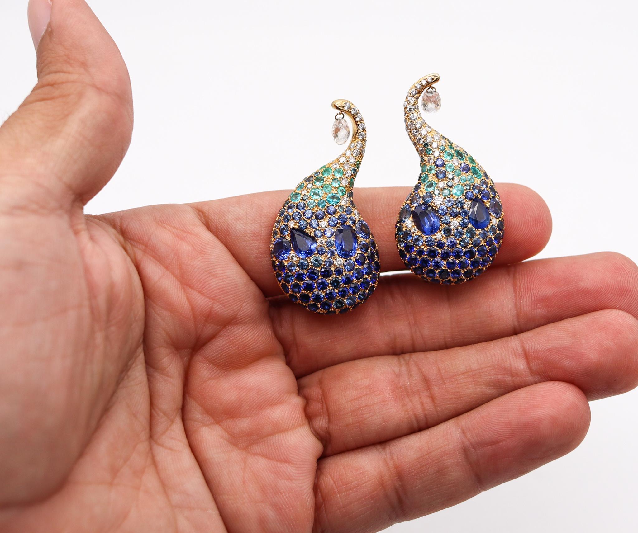 Free form earrings designed by Michelle Dalla Valle.

Exceptional pair of colorful clips-on earrings, created in Roma Italy by the jewelry designer Michele Della Valle. These flamboyant pieces has been crafted with a free form curve shape in solid