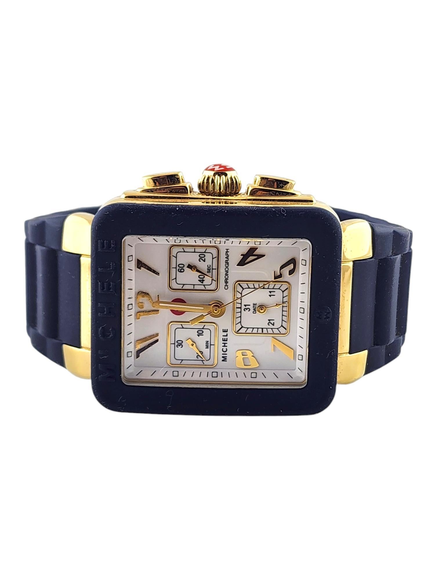 Michele Jelly Bean Park Ladies Watch

Model:  MWW06L000004

This fun watch has a yellow gold plated stainless steel case with a navy rubber bezel. 

White chrono dial with gold plated Arabic markers. 

Navy rubber watch band - watch is approx. 9