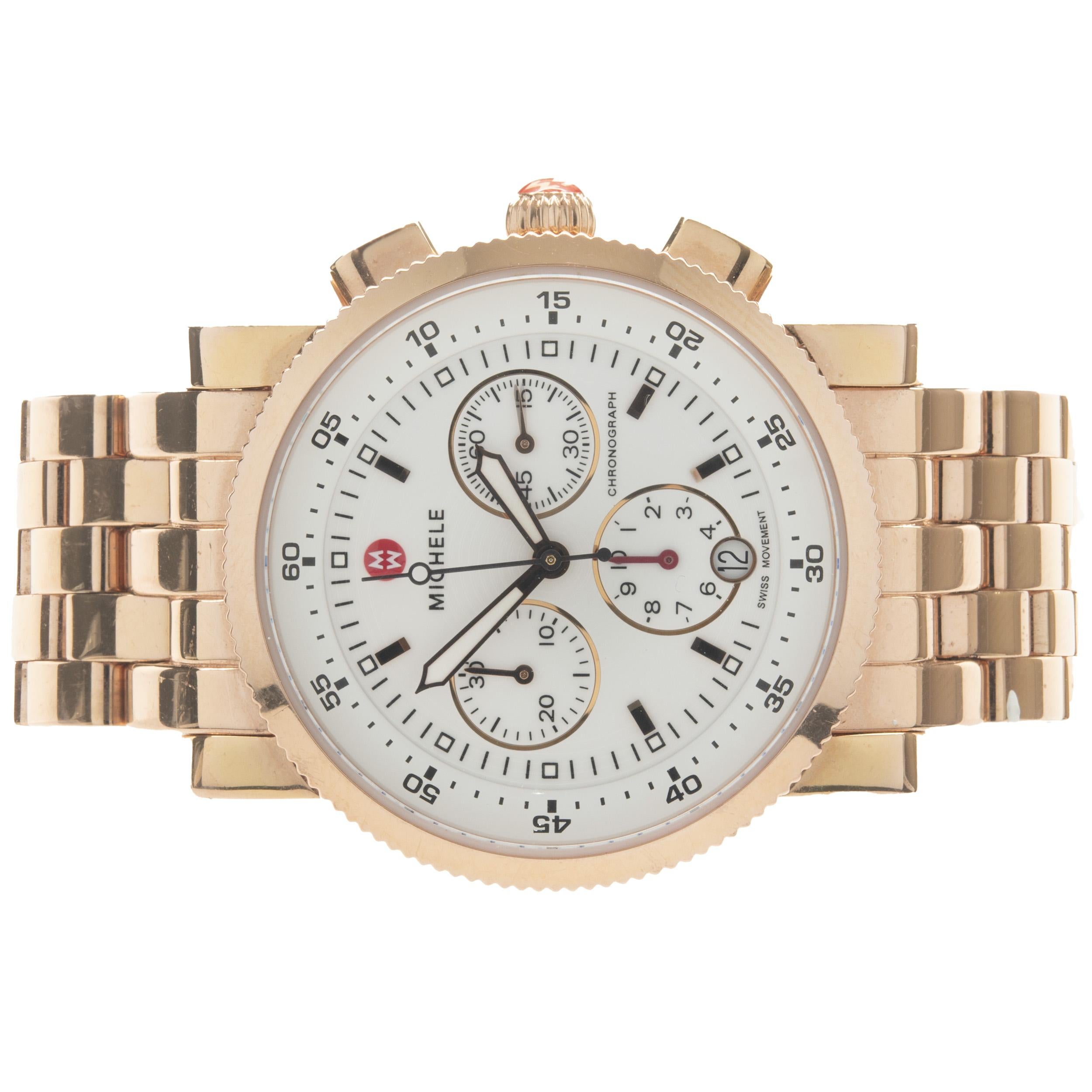 Movement: quartz
Function: hours, minutes, seconds, date, chronograph 
Case: 38mm rose stainless round case, sapphire crystal
Dial: white chronograph dial, stick hour markers 
Band: rose stainless steel sport sail link
Serial #: SS06XXX
Reference #: