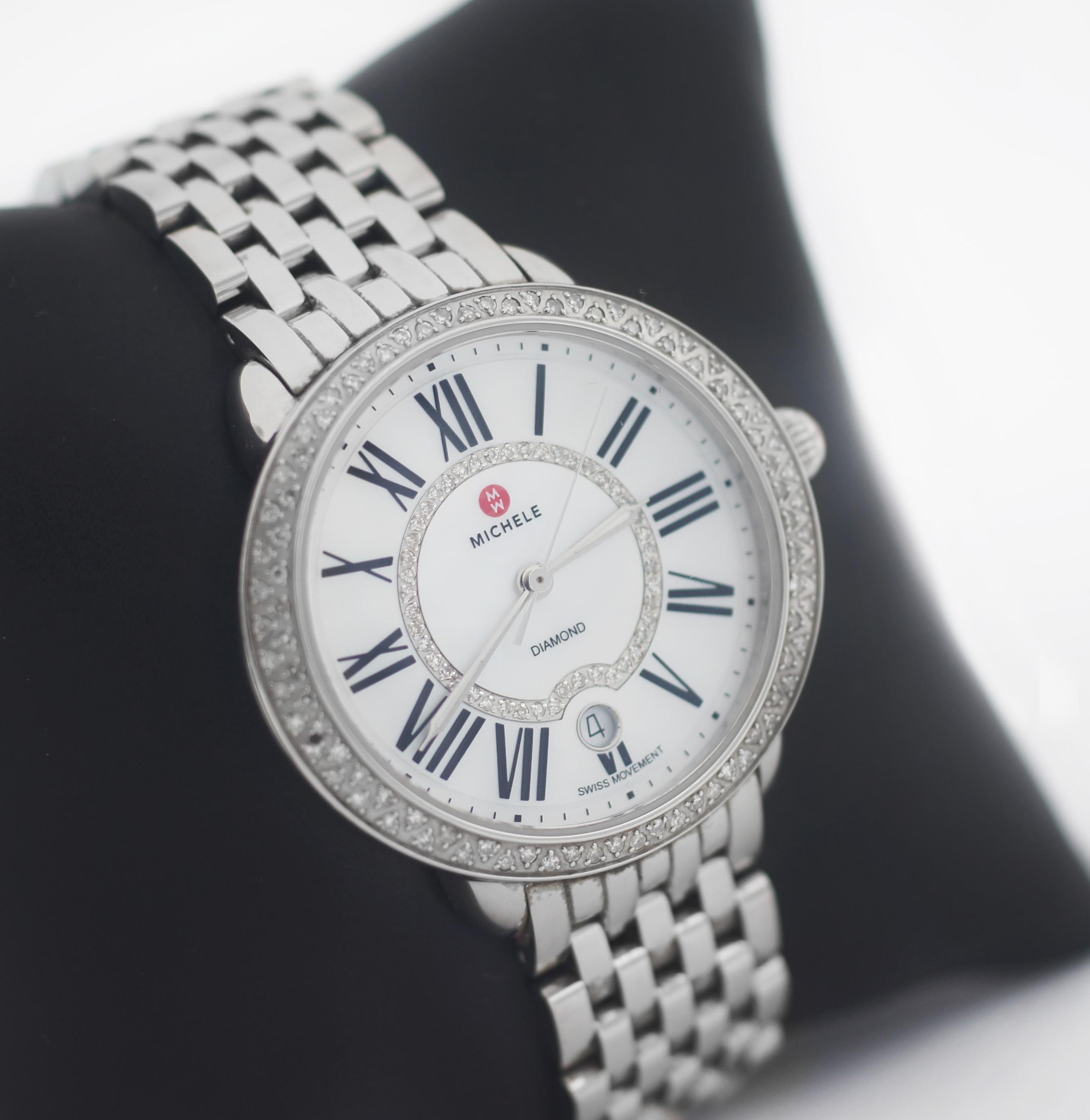 Michele
MW21B01A1963
Date window
Series: Serein
Movement: Swiss made Quartz
Stainless Steel case
Case approx. 36mm
Dial Color: Mother of Pearl / White with black roman numerals and single row diamonds
Date window at 6 o'clock
Round Diamond