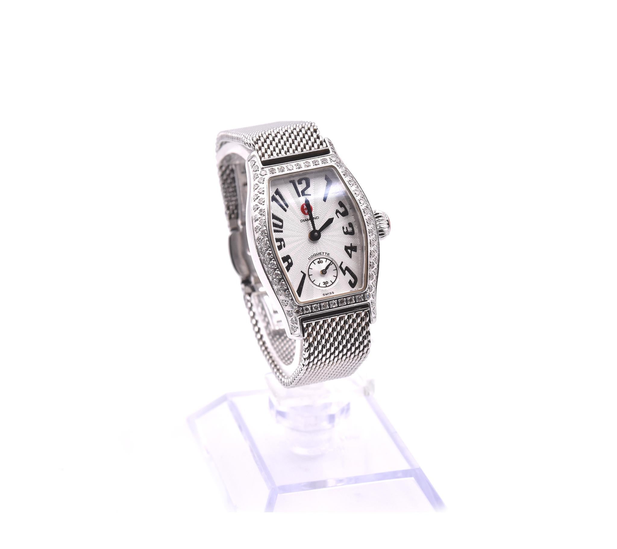 Movement: quarts
Function: hours, minutes, 
Case: 25mm x 22mm stainless steel case, sapphire protective crystal, diamond bezel
Dial: silver guilloche dial with Arabic numerals, sub seconds
Band: stainless steel band 
Serial #: M0396XXX
Reference #: