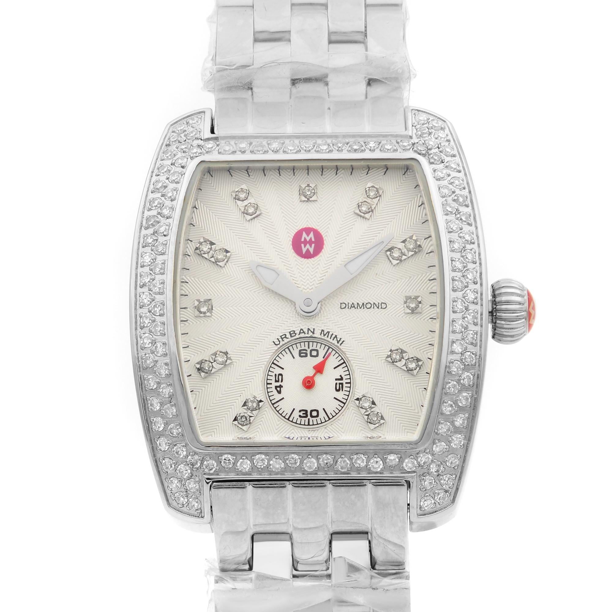 This New Without Tags Michele Urban MWW02A000508 is a beautiful Ladie's timepiece that is powered by quartz (battery) movement which is cased in a stainless steel case. It has a tonneau shape face, small seconds subdial dial, and has hand diamonds