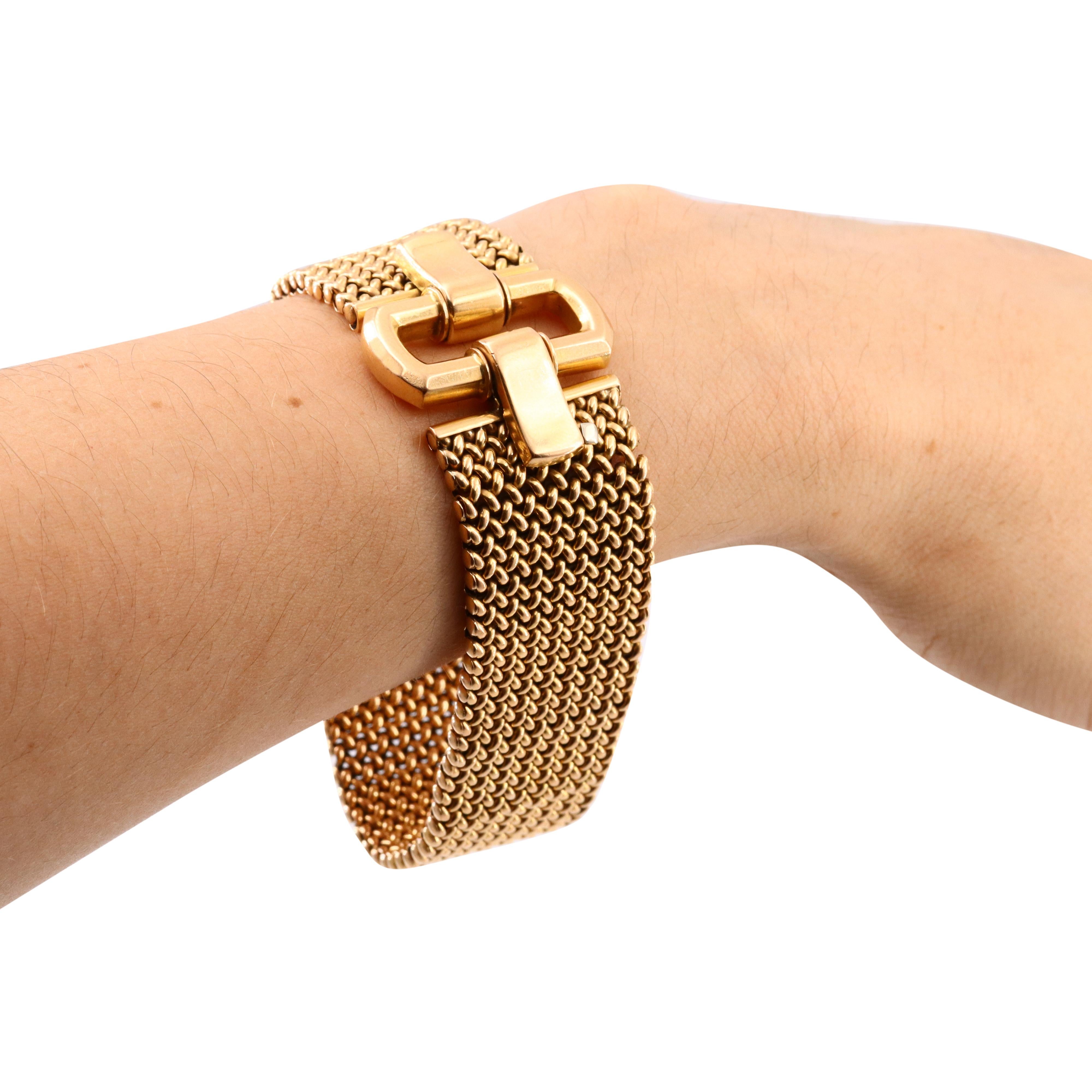 This stunning circa 1950 Retro bracelet is a masterpiece of Italian craftsmanship, designed by the renowned jeweler Emilio Micheletto. Crafted in 18k yellow gold, the bracelet features a distinctive geometric clasp and a luxurious rice grain