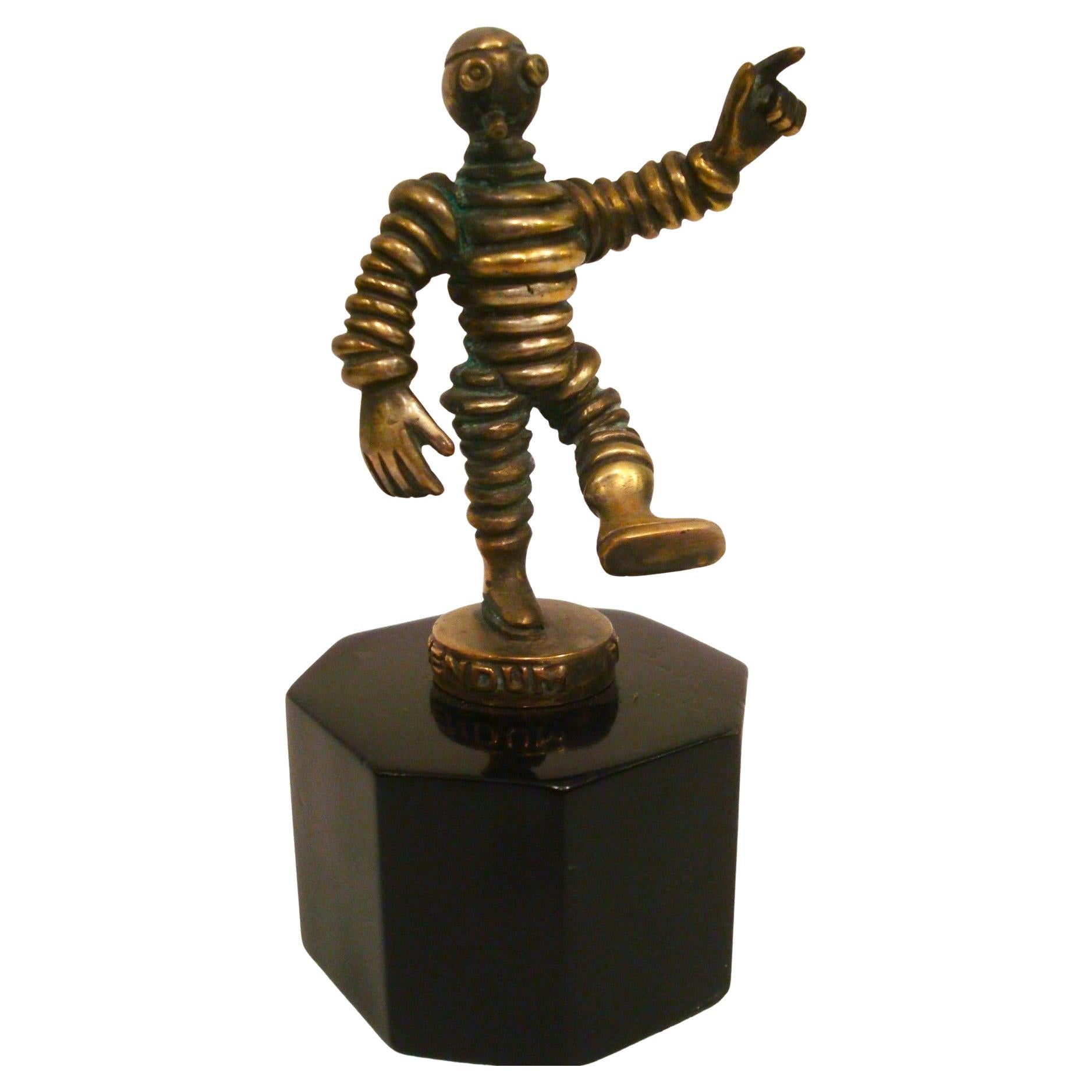 Michelin 1910 Slim-Skinny Bibendum Bronze Car Mascot Hood Ornament