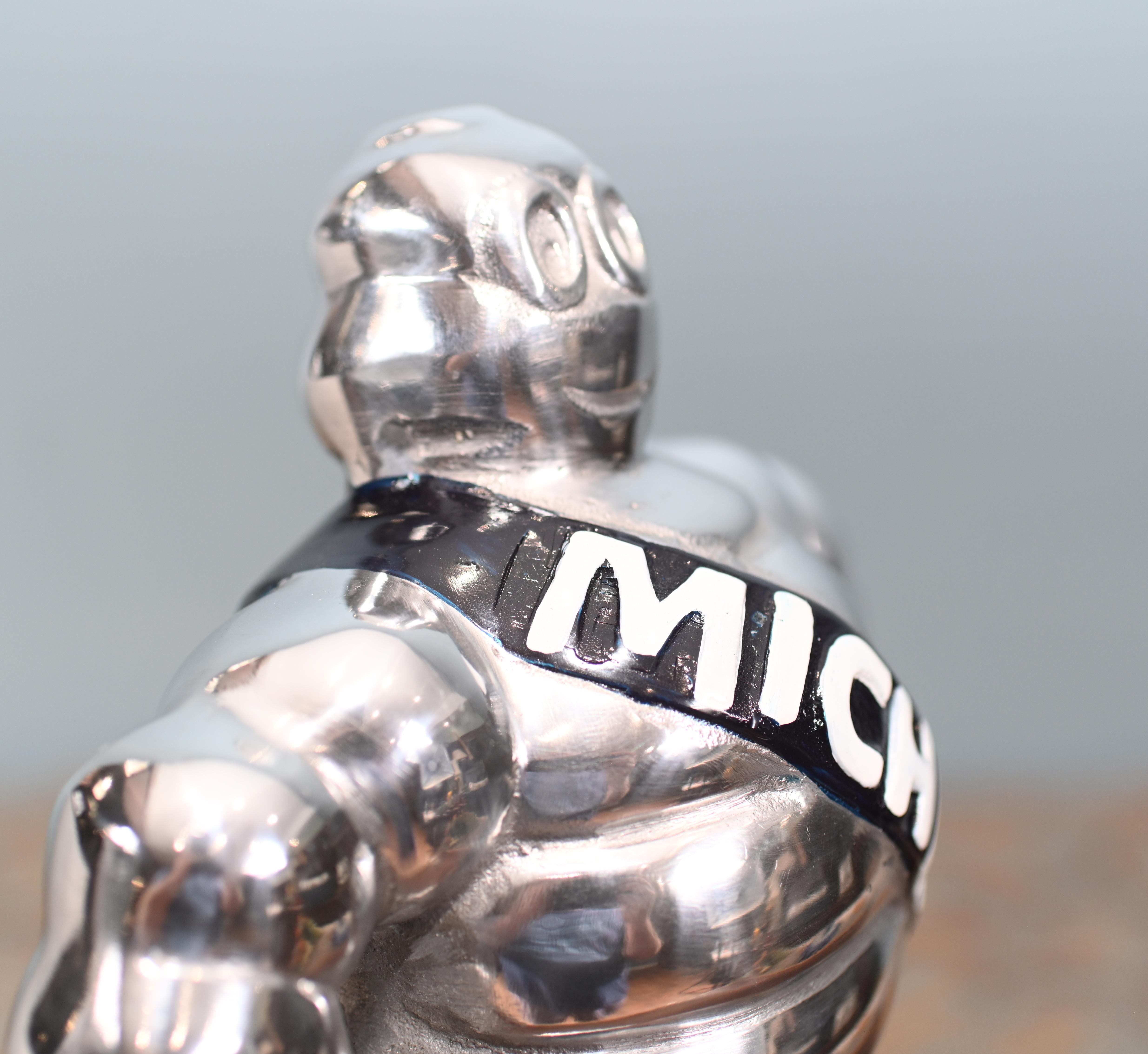 Late 20th Century Michelin Man Statue Silver Bibendum French Tire Casting For Sale