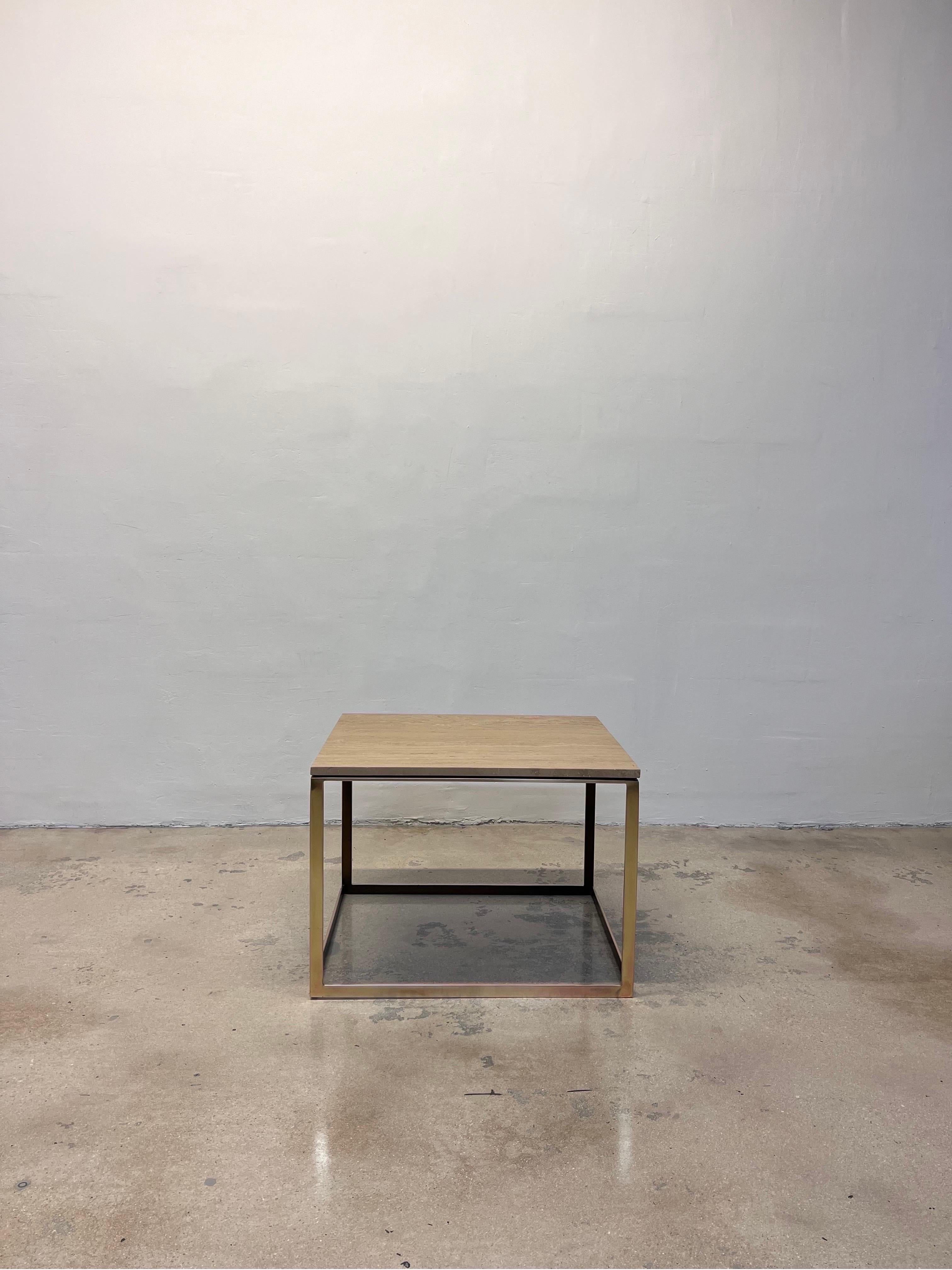 Italian travertine top side table on brass frame with patinated metal outside edges and bronze finish interior edges by Mitchell Gold + Bob Williams, 2014.