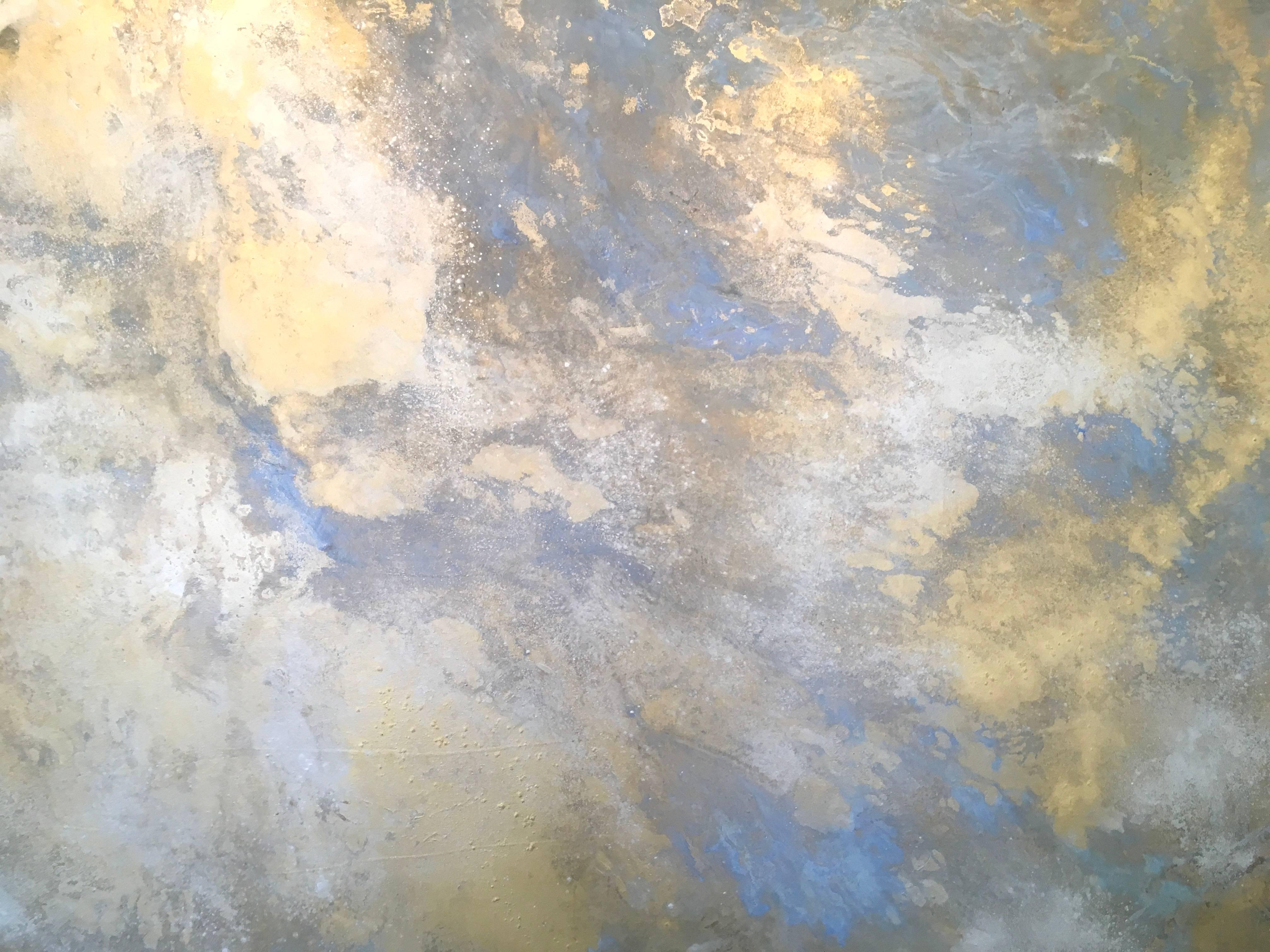 Michelle Gagliano, Rhosen, Oil and Oil Glazes and Gold Leaf on Wood Panel, 48x48.  Rhosen is inspired by the Sun coming out after a rainstorm.  It conveys a strong sense of beauty and optimism.  As you move around the artwork, the light changes as