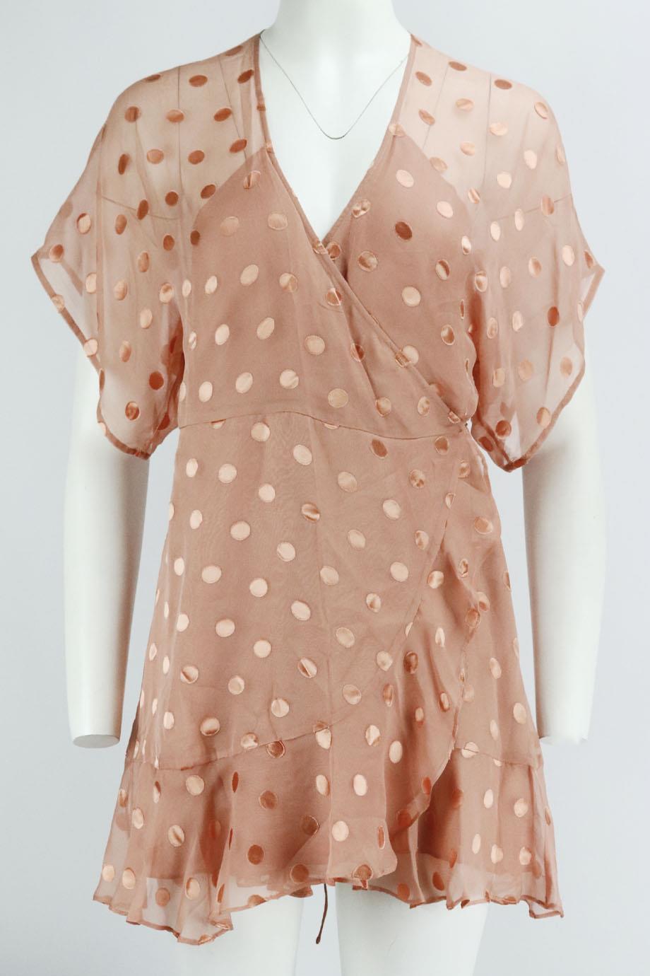 Michelle Mason ruffled polka dot silk blend mini wrap dress. Pink. Short sleeve, v-neck. Tie fastening at front. 55% Silk, 45% rayon; lining: 100% Silk. Size: US 4 (UK 8, FR 36, IT 40). Bust: 36 in. Waist: 31 in. Hips: 40 in. Length: 33 in Very good
