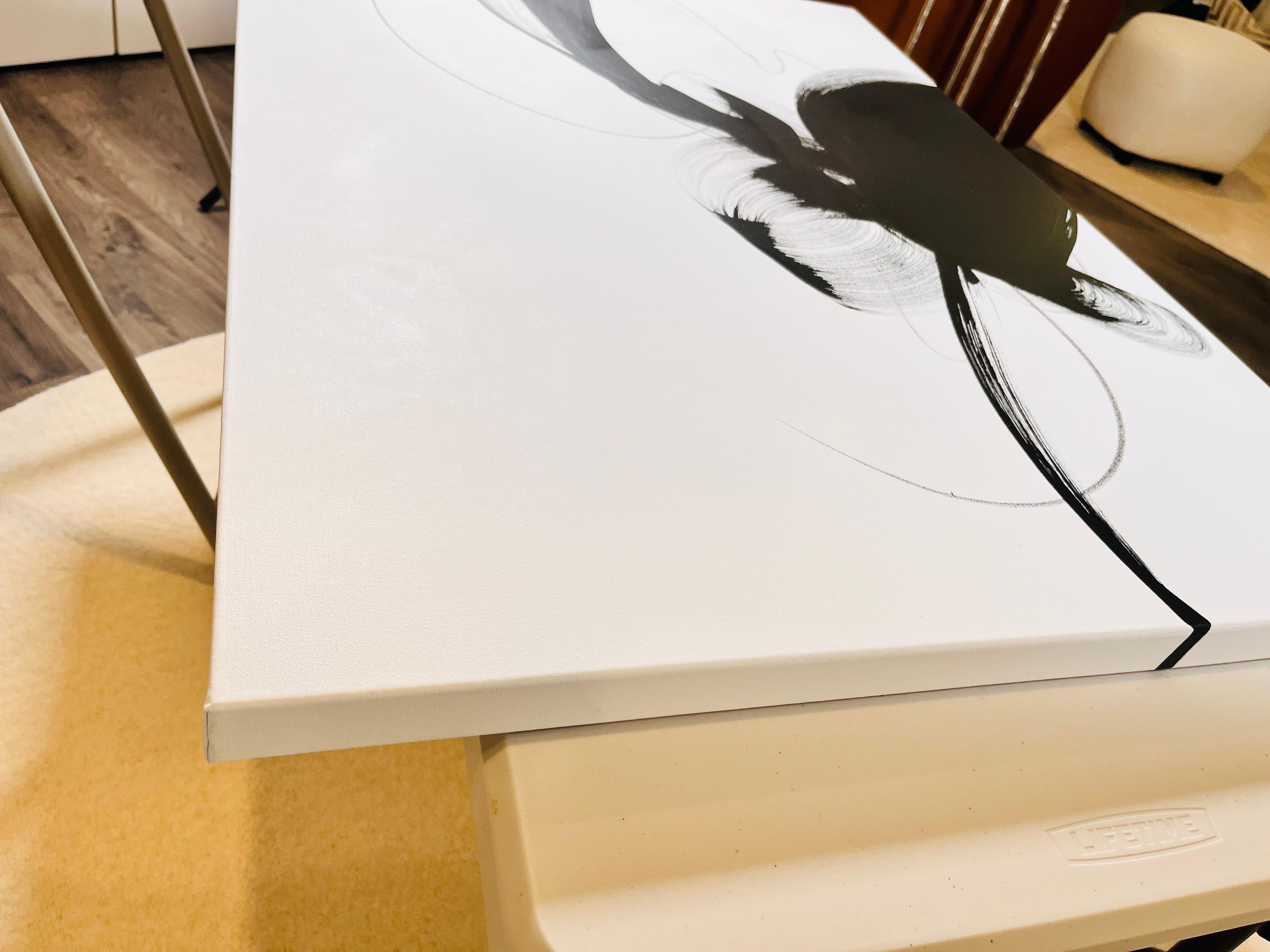 “Disobedience” is a striking large-scale acrylic painting that turns restraint into a powerful act of defiance. Using a bold black-and-white palette and expansive negative space, Michelle Thomas creates a piece that is both minimal and emotionally