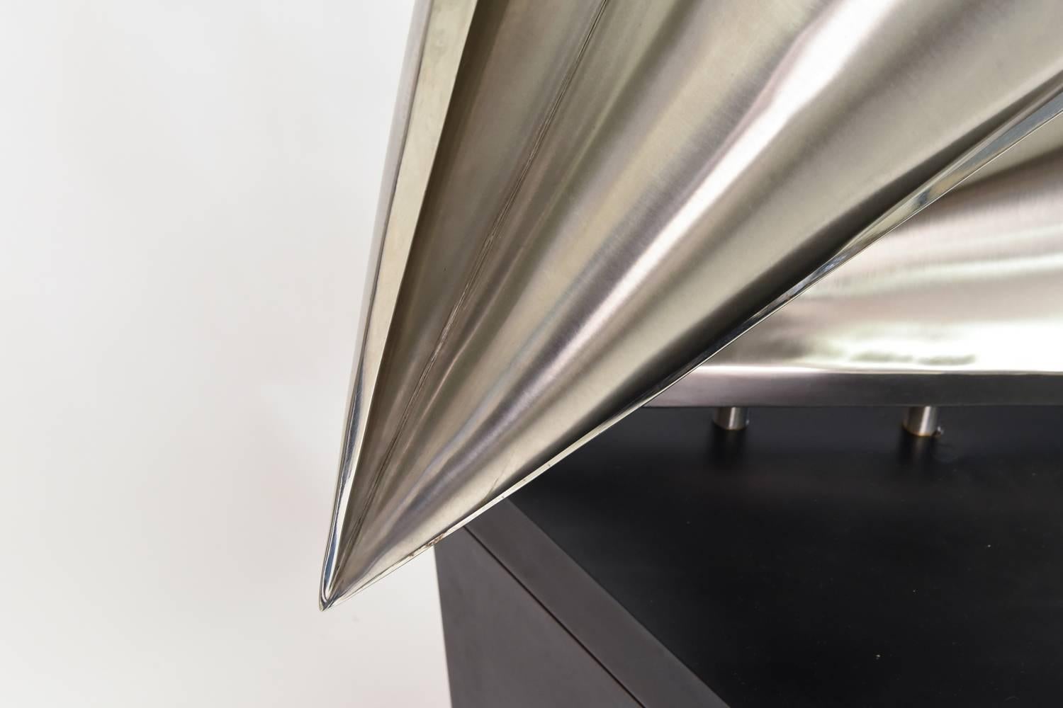 An abstract steel sculpture by American artist Michi Raphael entitled 