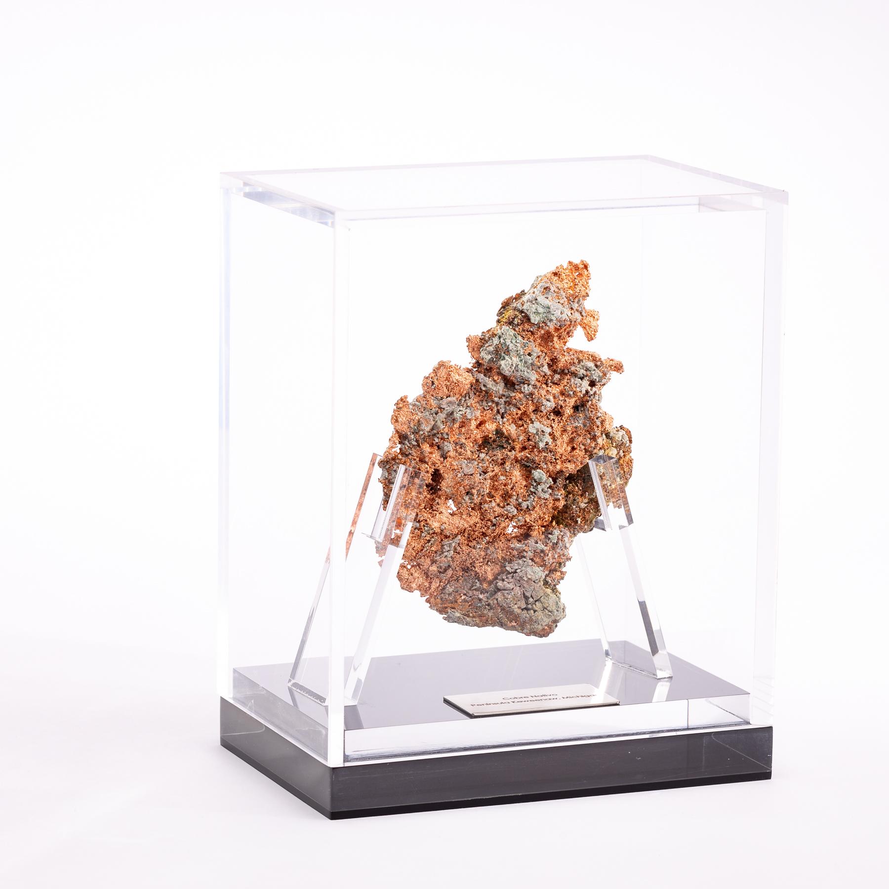 Native copper nugget from Michigan mounted in a custom made acrylic case.
 
  