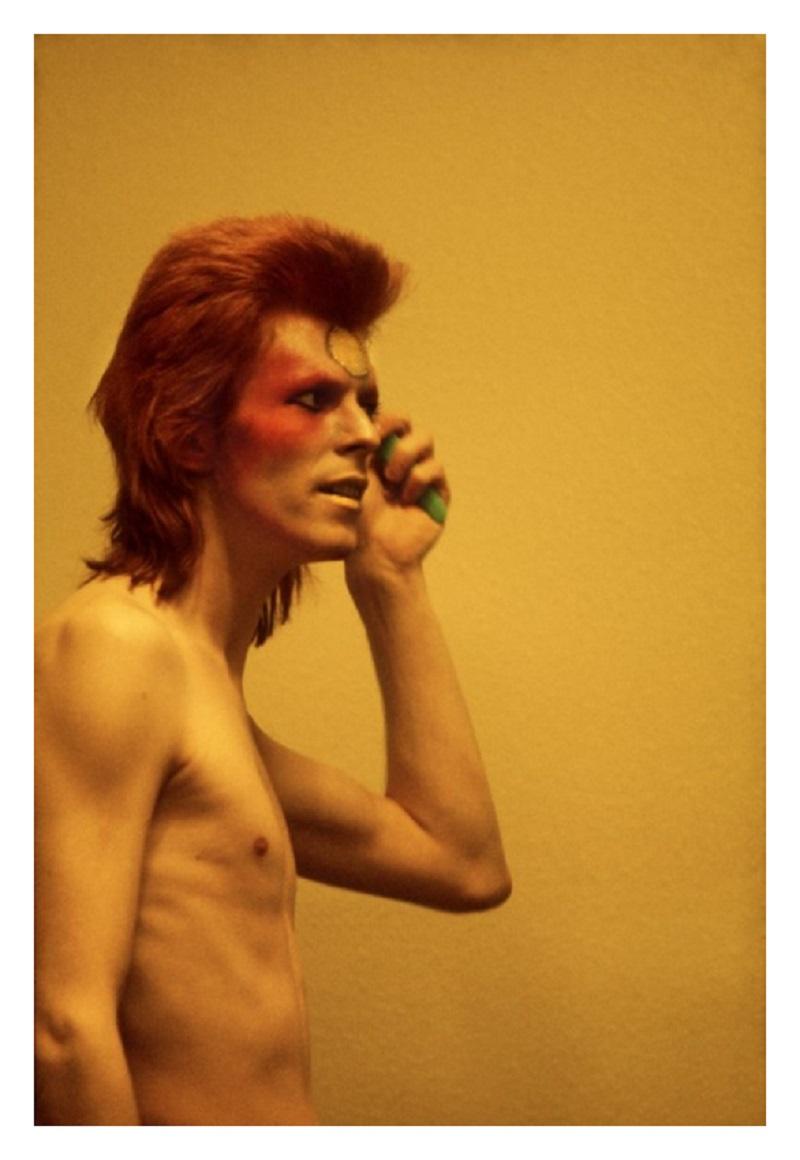 David Bowie - Limited Edition Mick Rock Estate Print 

David Bowie backstage, 1973 (photo Mick Rock).

All prints are numbered by the Estate.
Edition size varies according to print size.

Unframed Archival Pigment Print
Print Size: 20 x 16" / 50 x