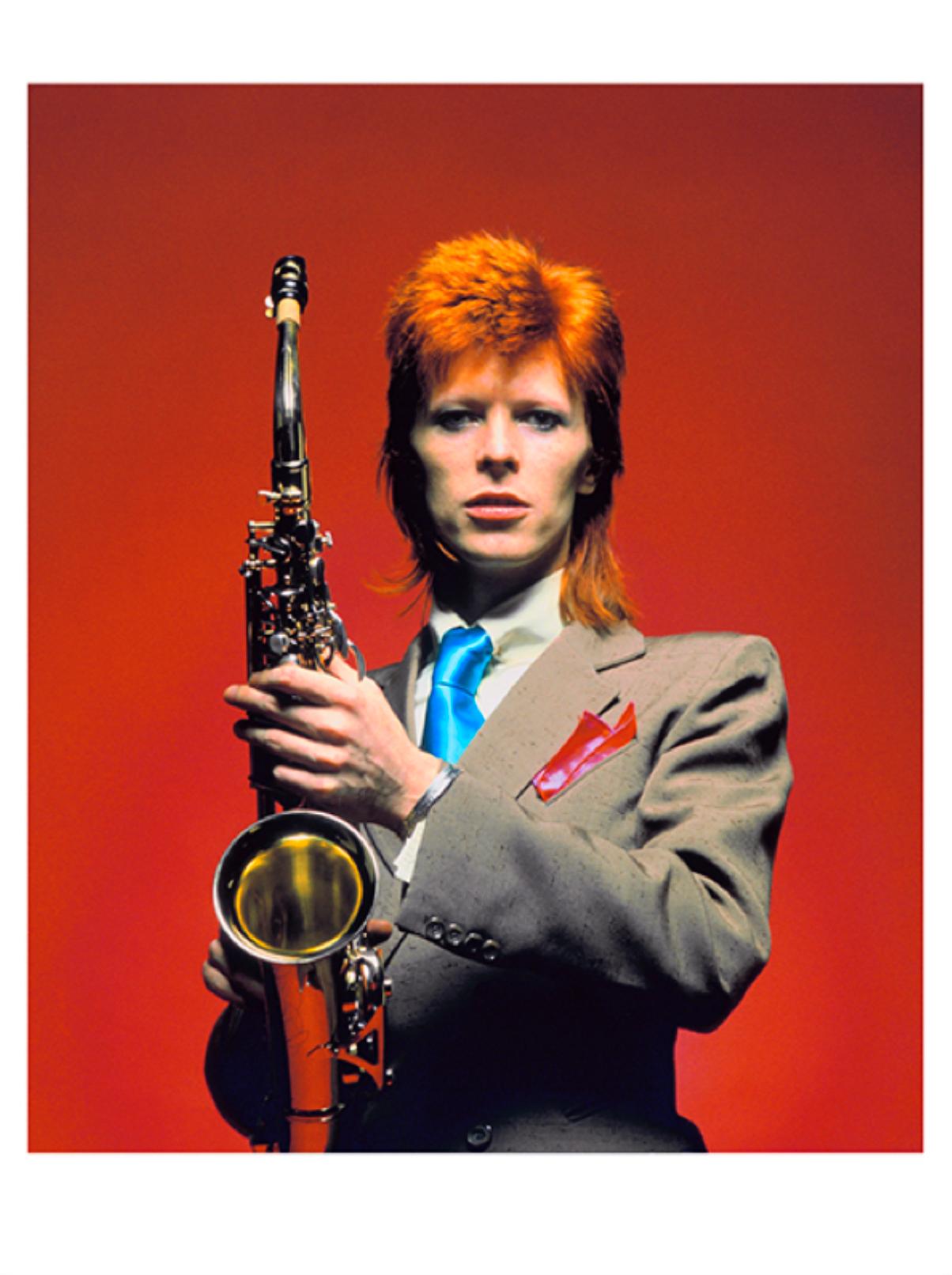 David Bowie with Saxophone (Framed) hand signed limited edition  - Photograph by Mick Rock