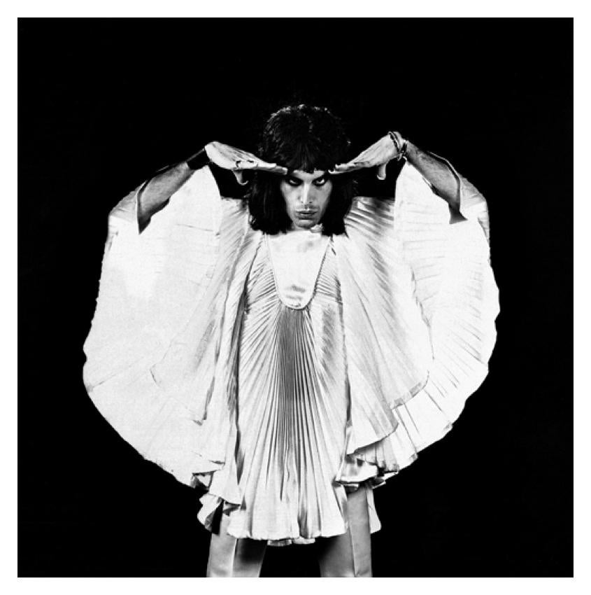 Freddie Mercury - Limited Edition Mick Rock Estate Print 

Freddie Mercury in a white tunic, 1974 (photo Mick Rock).

All prints are numbered by the Estate.
Edition size varies according to print size.

Unframed Archival Pigment Print
Print Size: 16