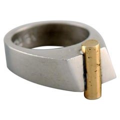 Micke Berggren, Sweden, Modernist Designer Ring in Pewter and Brass, Late 20th c