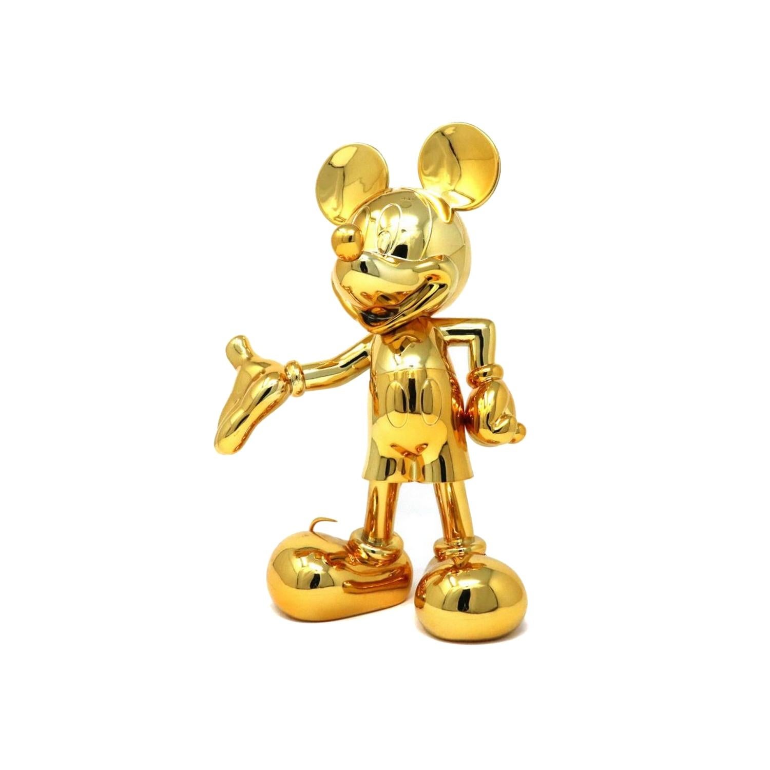 gold mickey mouse statue