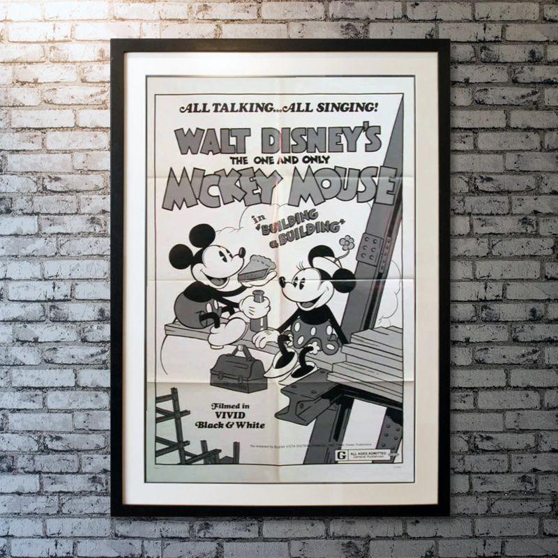 Mickey Mouse - Building A Building, Unframed Poster, 1974

Original One Sheet (27 X 41 Inches). Mickey Mouse operates a steam shovel; Pegleg Pete is his foreman; Minnie Mouse sells box lunches. Mickey must save the day when Pete makes advances to