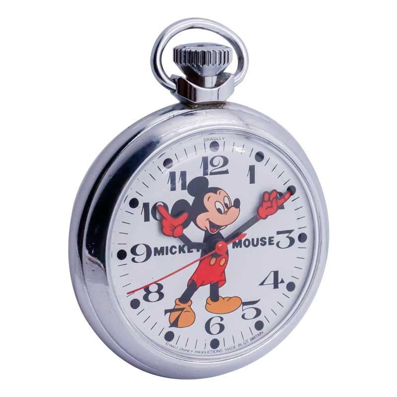 FACTORY / HOUSE: Mickey Mouse
STYLE / REFERENCE: Open Faced Pocket Watch
METAL / MATERIAL: Stainless Steel
CIRCA / YEAR: 1960's
DIMENSIONS / SIZE:  Diameter 57mm
MOVEMENT / CALIBER: Manual Winding 
DIAL / HANDS: Original White 
WARRANTY: 18 months