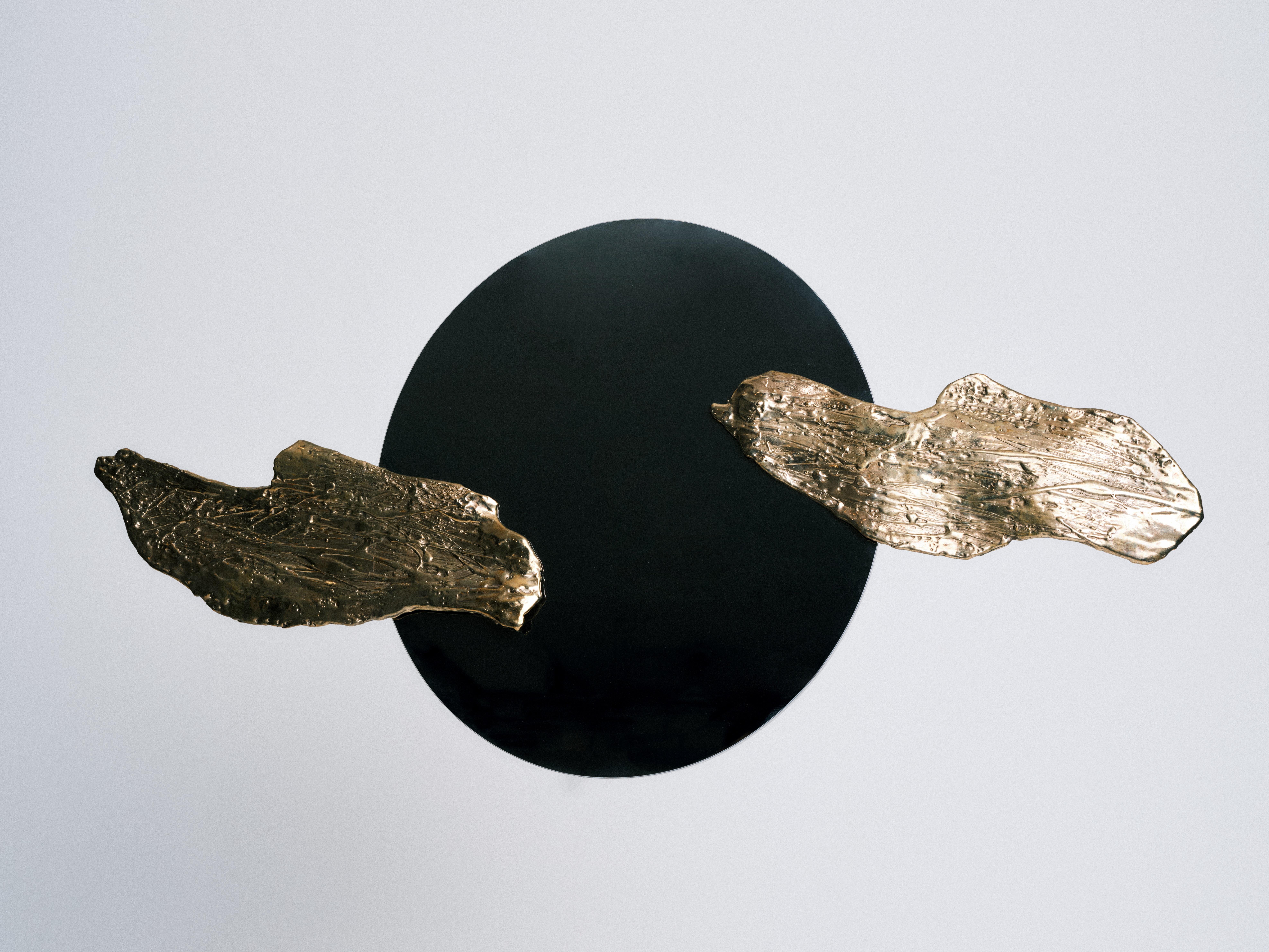 Micol Mirror by BRNV Studio
Dimensions: D 10 x W 90 x H 50 cm (Dimensions may vary).
Materials: Recycled plastic, bronze.

This artwork piece is a beautiful representation of the growing relationship between Vivee and her sister Micol. It explores