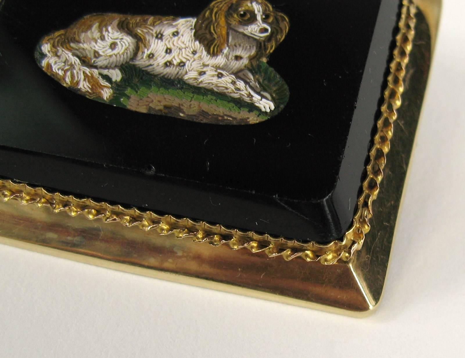 Wonderful Micro-Mosaic Brooch and Pendant, Depicting a King Charles Spaniel.  Does double duty, truly a wonderful piece. Antique C style pin back. Set in 15kt Yellow Gold . Measuring 1.83 in wide x 1.45 in top to bottom. This is out of a massive