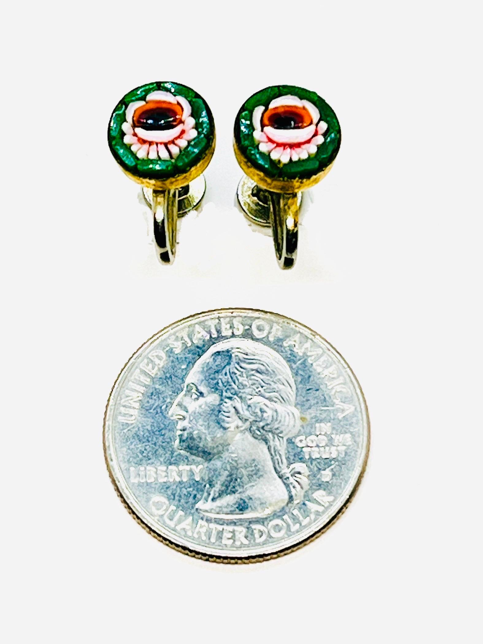 Emerald green Antique Micro Mosaic with Salmon matching pink/red and white Camelia Flower Design, small stud earrings with a screwback, made in Italy, 1900s 

Fourteen very small tiles are inlaid on each earring, achieving a flatter top than I see