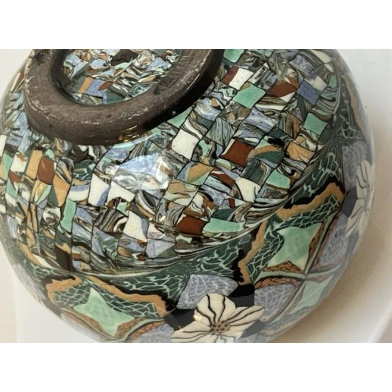 Micro-Mosaic Ceramic Vase by Jean Gerbino for Vallauris, France, 1950s

Additional information:
Materials: Ceramic, Enamel
Color: Green, Black, Olive
Design Period: 1950 to 1959
Creator: Jean Gerbino
Year: 1950
Country of Manufacture:
