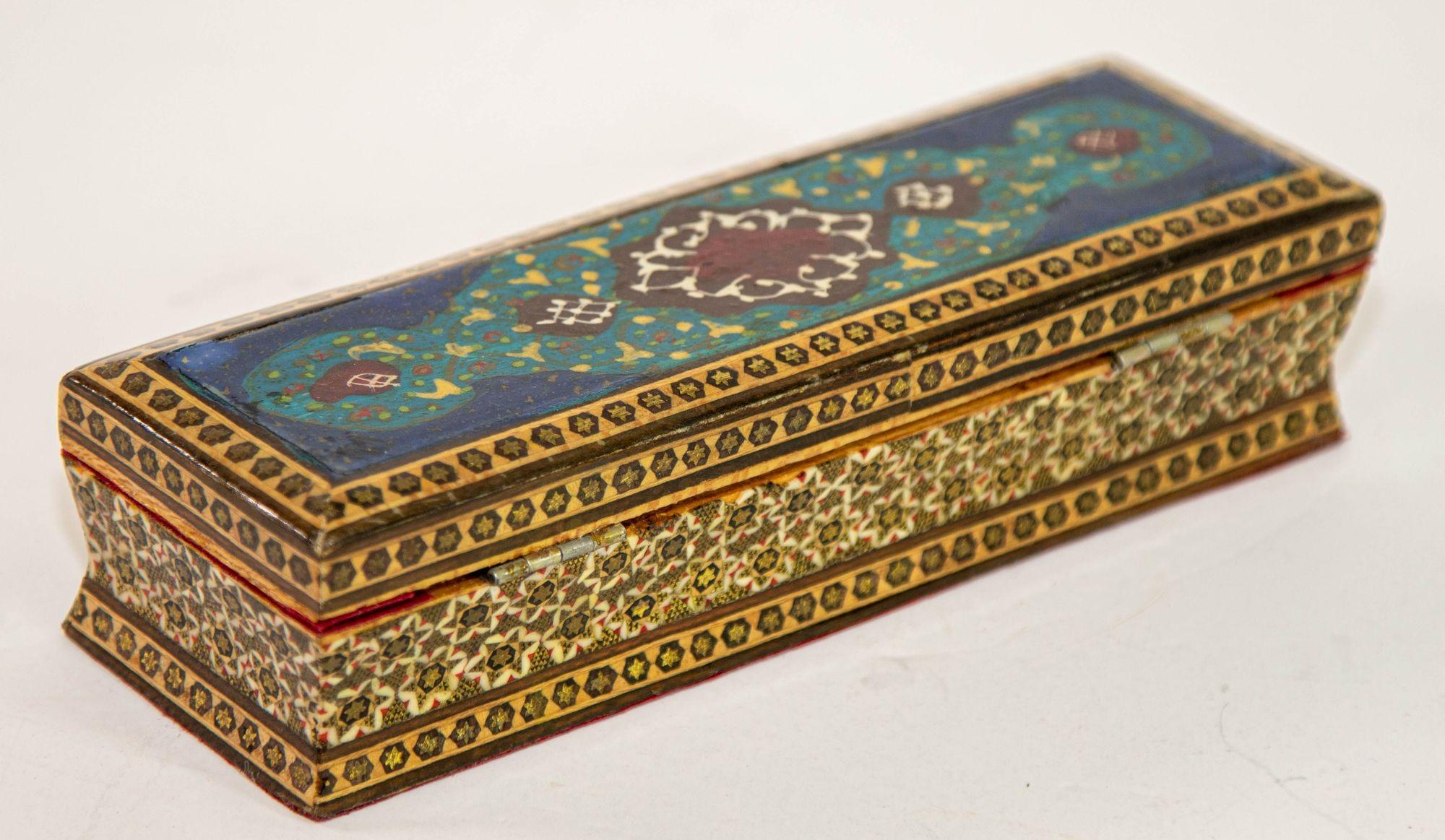 Micro Mosaic Persian Islamic Moorish Inlaid Jewelry Pen Box.
1950s Middle Eastern Moorish Inlaid Jewelry Trinket Mosaic Box.
Handcrafted marquetry Moorish wood inlay micro mosaic with miniature hand painted top.
Handcrafted marquetry Middle Eastern