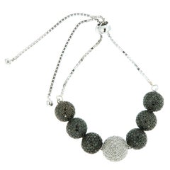 Bracelet de perles en forme de boule en or avec diamants noirs et blancs micro-pavés