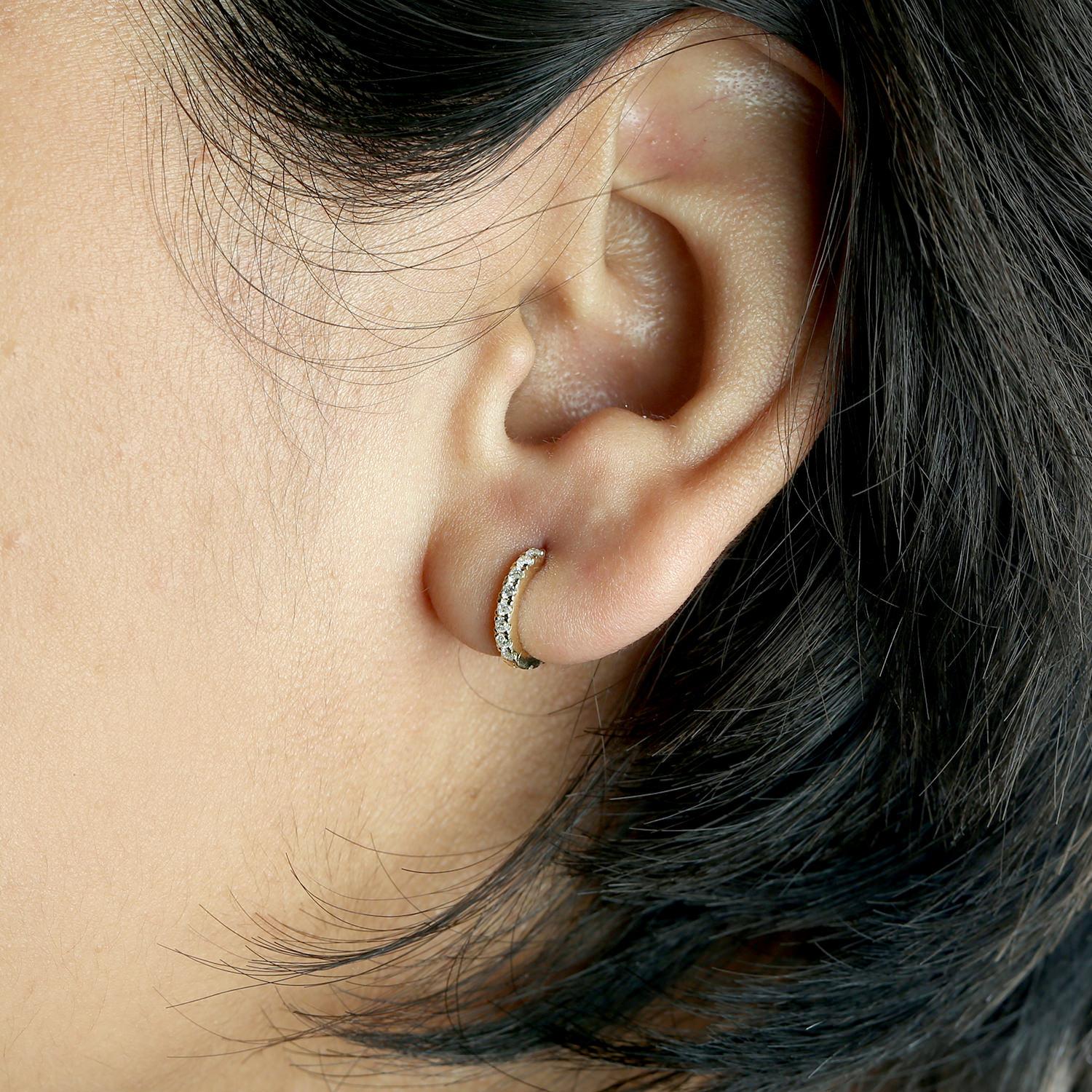 The Micro Pavé Diamond Hoop Earrings are a refined blend of elegance and sparkle, crafted in luxurious 18K yellow gold.

18KT:1.555g,
Diamond:0.45ct, 
