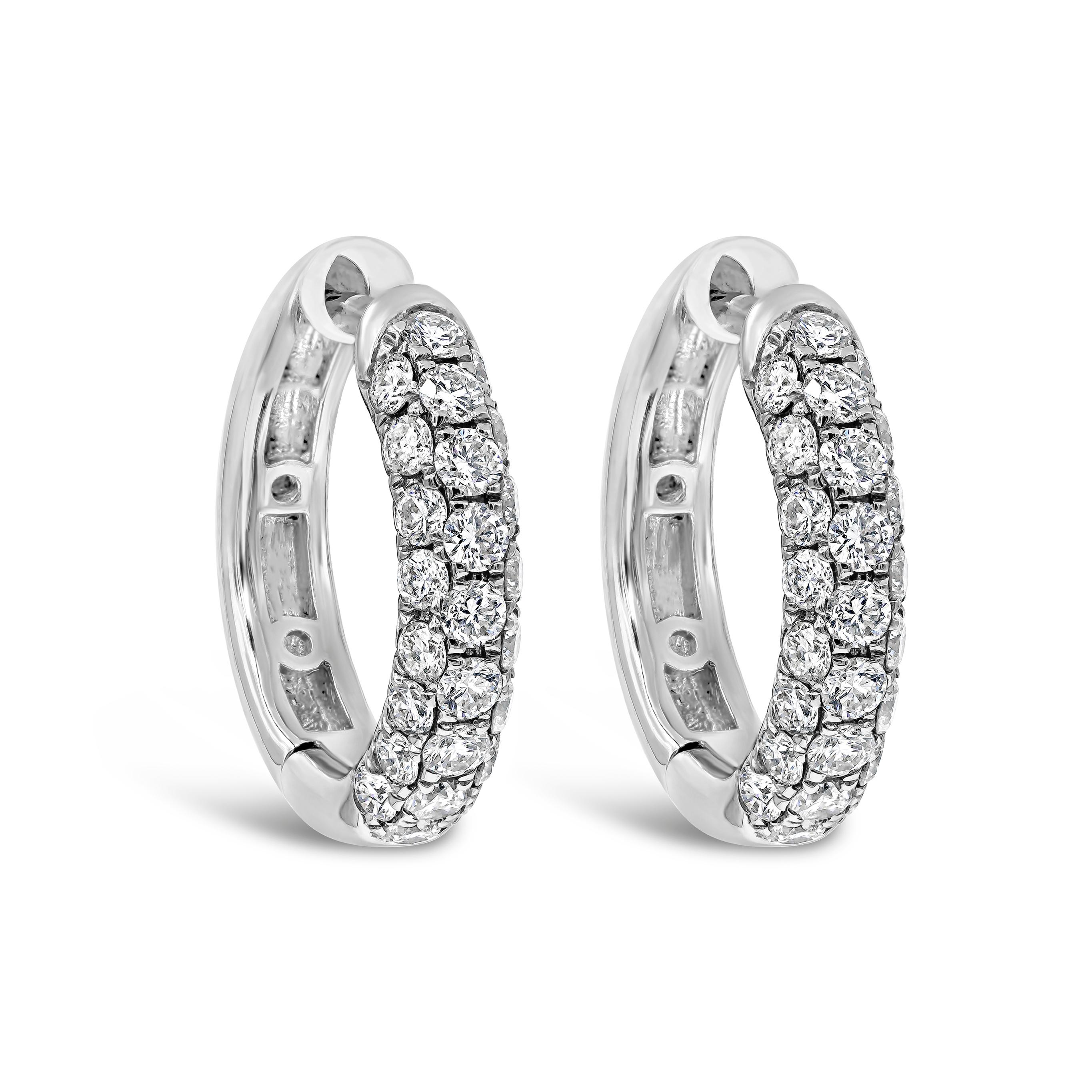 A versatile and everyday pair of hoop earrings showcasing 0.74 carats of round brilliant diamonds, set in a micro-pave rounded setting. Made in 18K White Gold.

Style available in different price ranges. Prices are based on your selection. Please