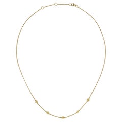 Microlight Gold Necklace by Lucie Heskett-Brem