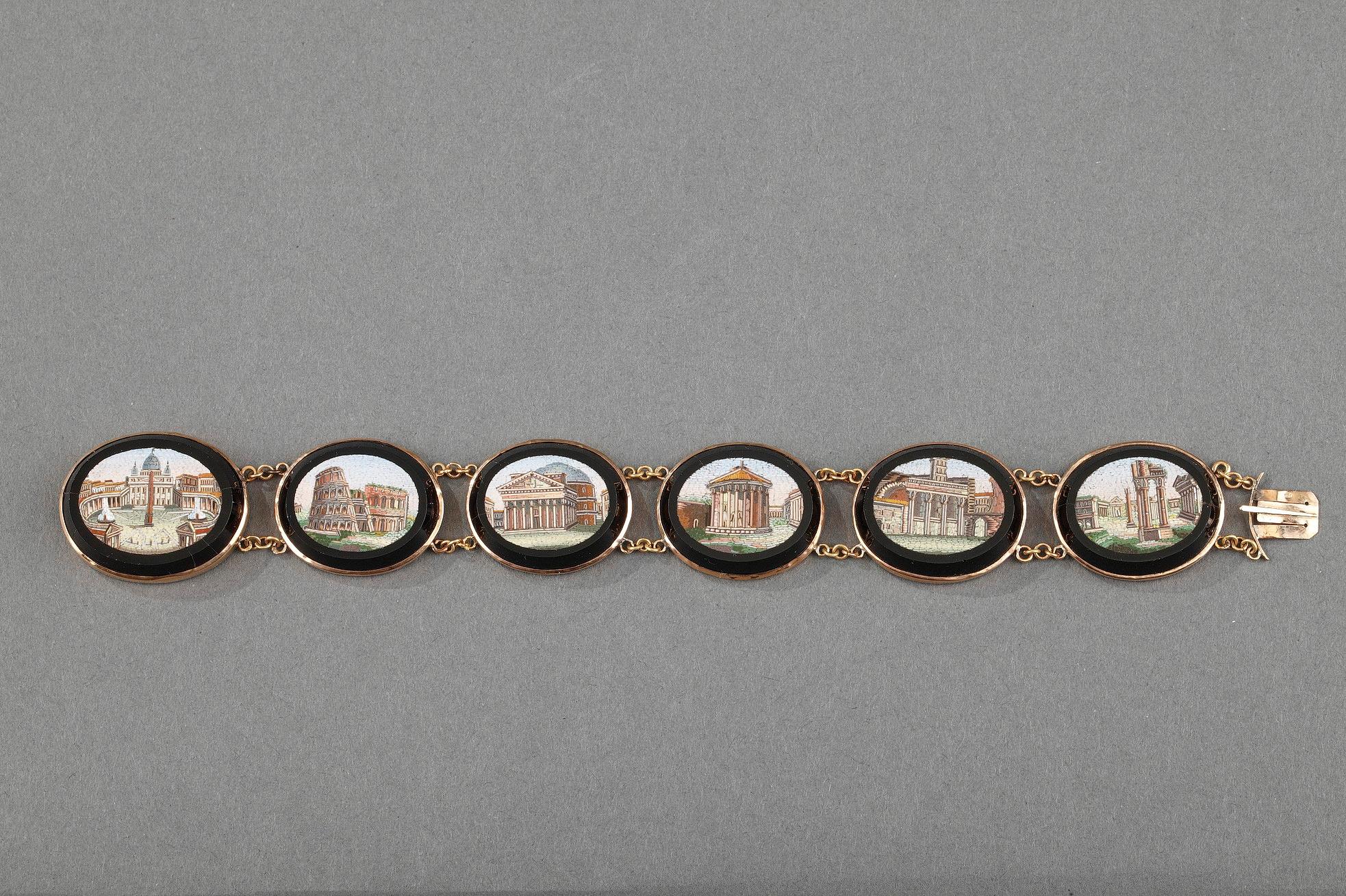 Gold bracelet with six oval, micromosaic medallions set in black glass. Each micromosaic represents a different Roman edifice: Saint Peter’s Basilica, the Coliseum, the Pantheon, the Temple of Vesta, the Temple of Antonius and Faustina, and the