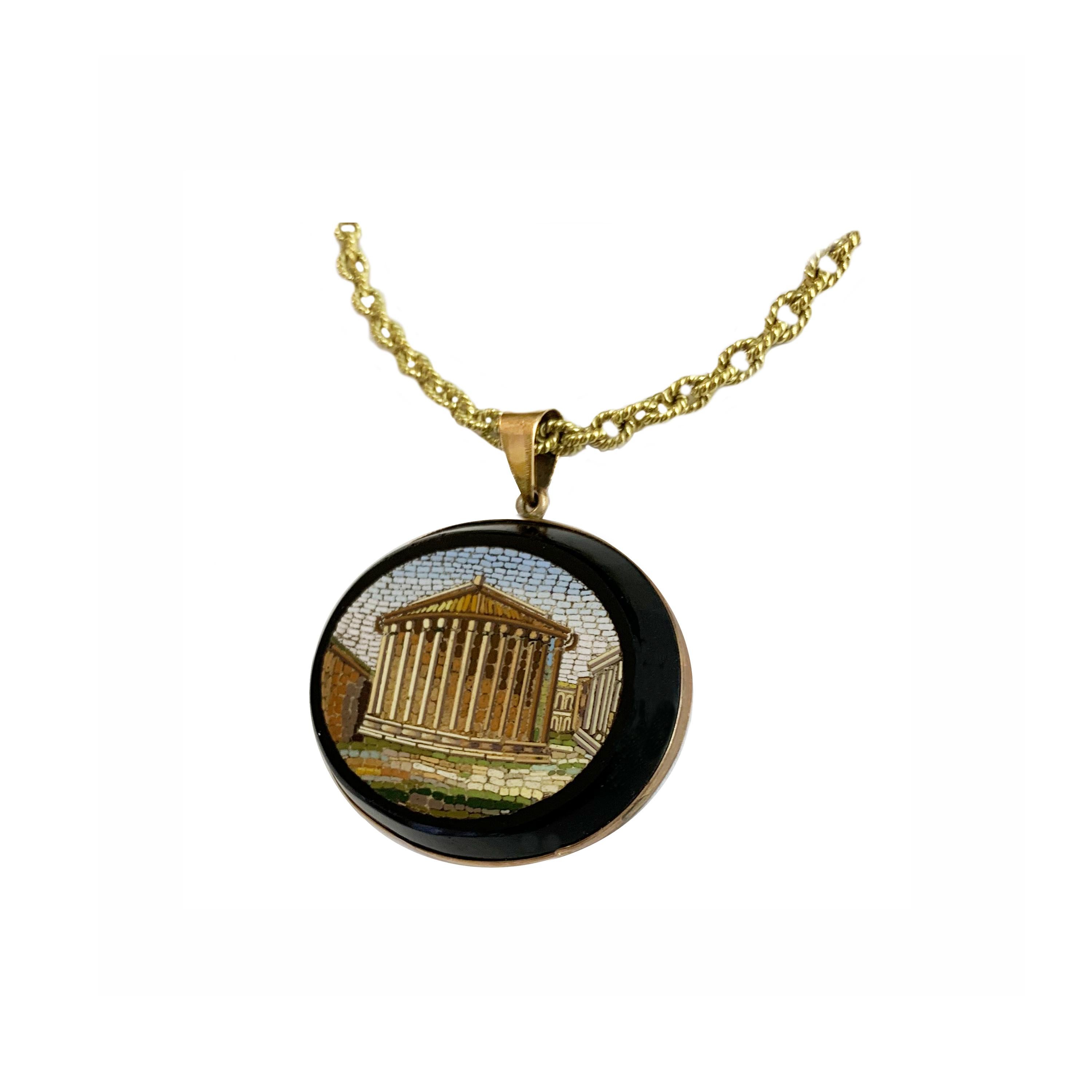 Oval micromosaic pendant, representing a view of the so-called Temple of Vesta in  Rome, set on black marble.
Rome 1850's Vatican Mosaic Workshop
The 