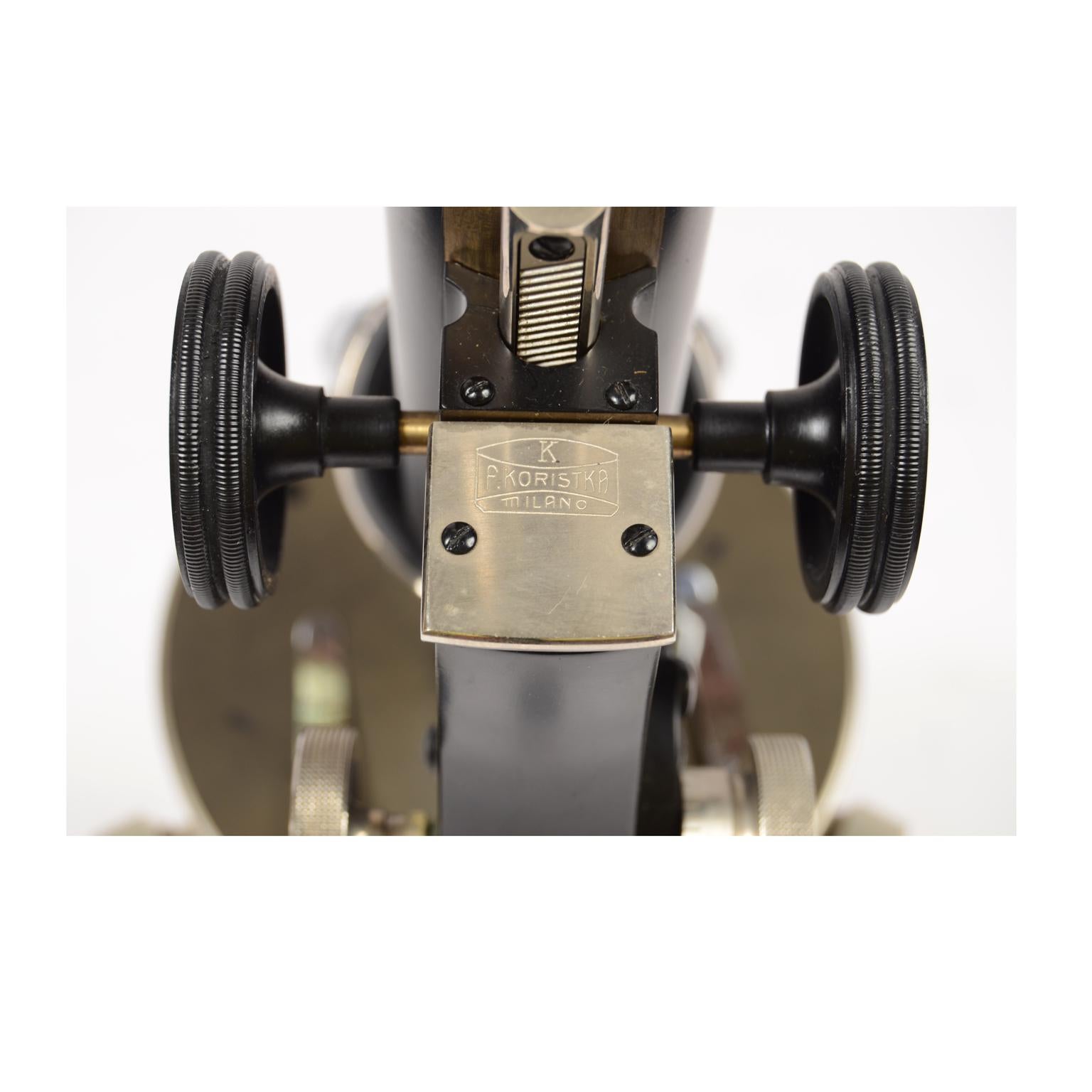 Optical microscope signed F.lli Koristka Milano n. 42870 produced between 1920/30, of chromed and black painted brass, three-magnification turret, consisting of a stand and a plate where the object or slide to be observed is placed, the light is