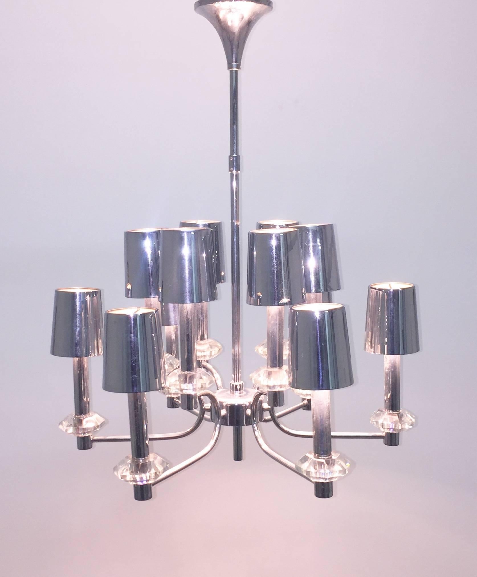 Midcentury nickel and crystal chandelier in the style of Sciolari,
circa 1970s.
Socket: 12 x E14 Edison for standard screw bulbs.
Excellent condition.