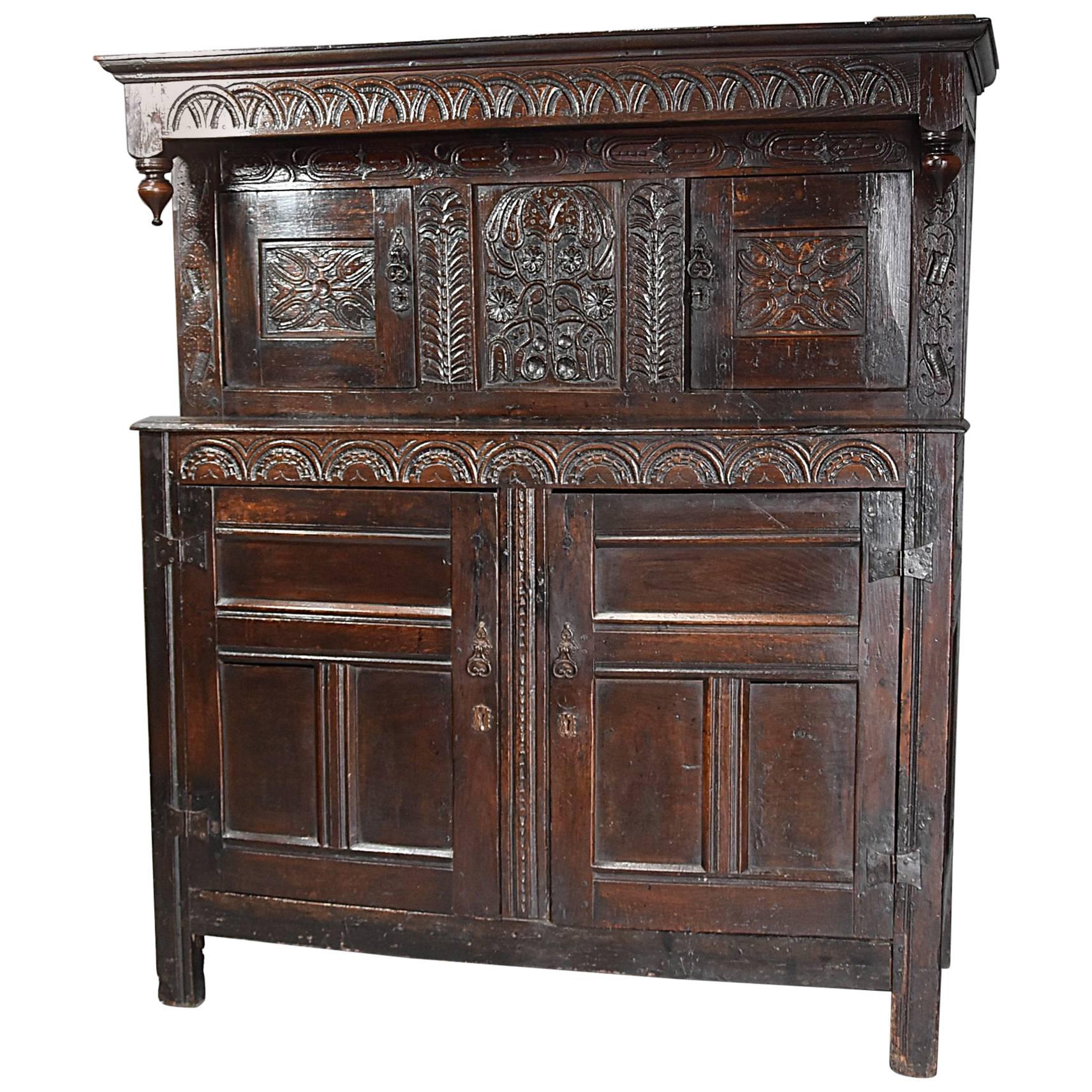 Mid-17th Century Carved Oak Press Cupboard with Superb Original Patina For Sale