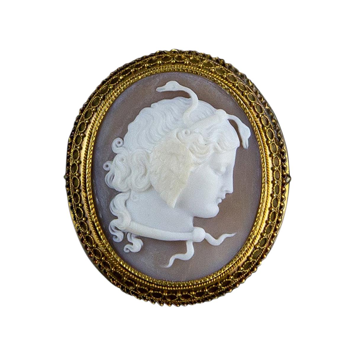 Mid 1800s 18 Kt Yellow Gold Antique Brooch with Shell Cameo Depicting “Medusa” For Sale