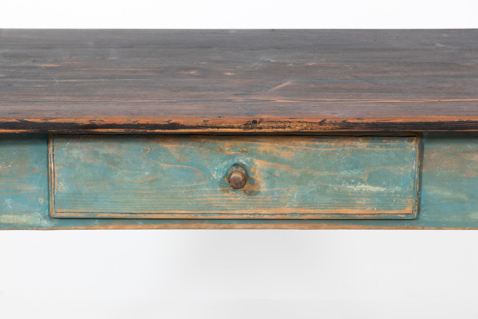 Blue painted table with black painted top, straight tapered legs, and one drawer, circa mid-1800s.