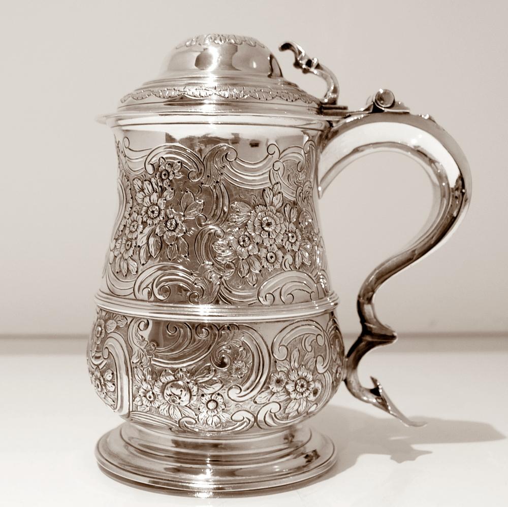 A very handsome mid-18th century later chased baluster formed tankard and cover. The later floral chasing is set on a matt background for decorative contrast. The handle is double scroll and the domed lid is hinged.

 

Weight: 29.4 troy