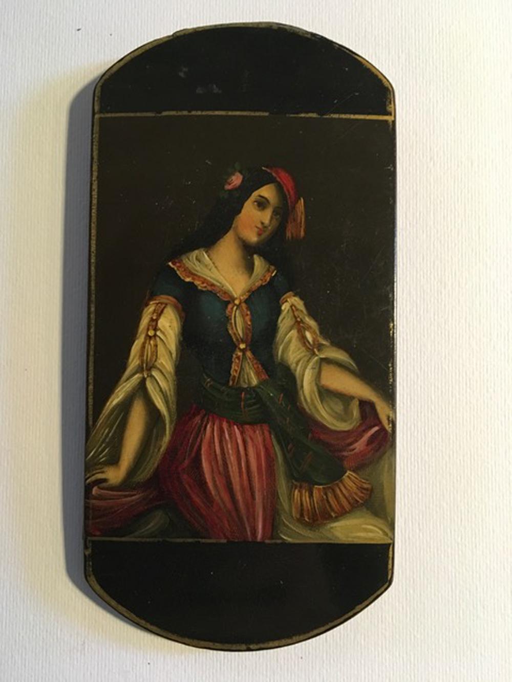 This antique and fine lacquered wood box, is painted on both the sides with an elegant portrait of a woman and on the other side a dancer.

The piece will be delivered with its certificate of Authenticity