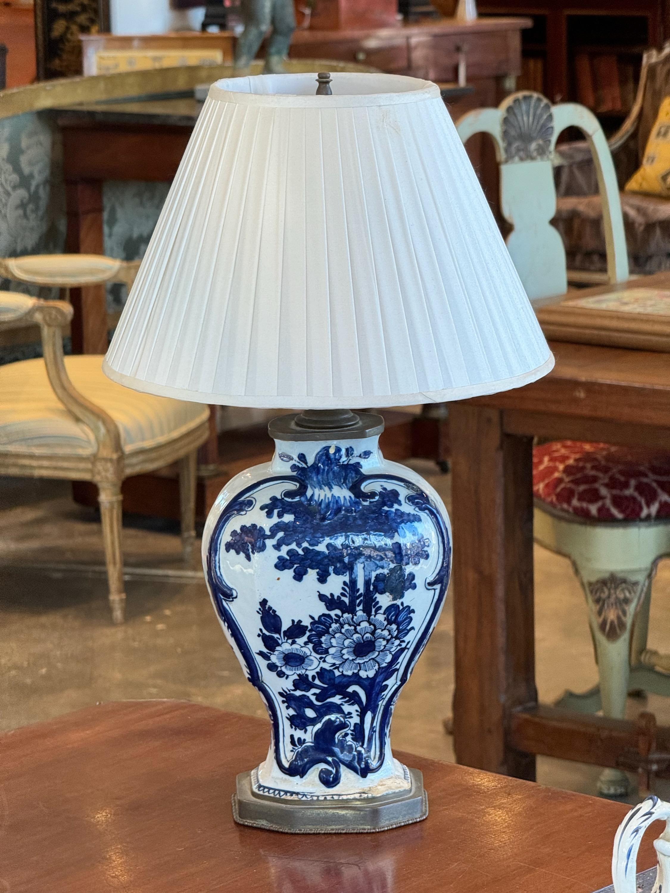 A great delft vase that has been converted to a lamp. Made in the Mid 18th Century