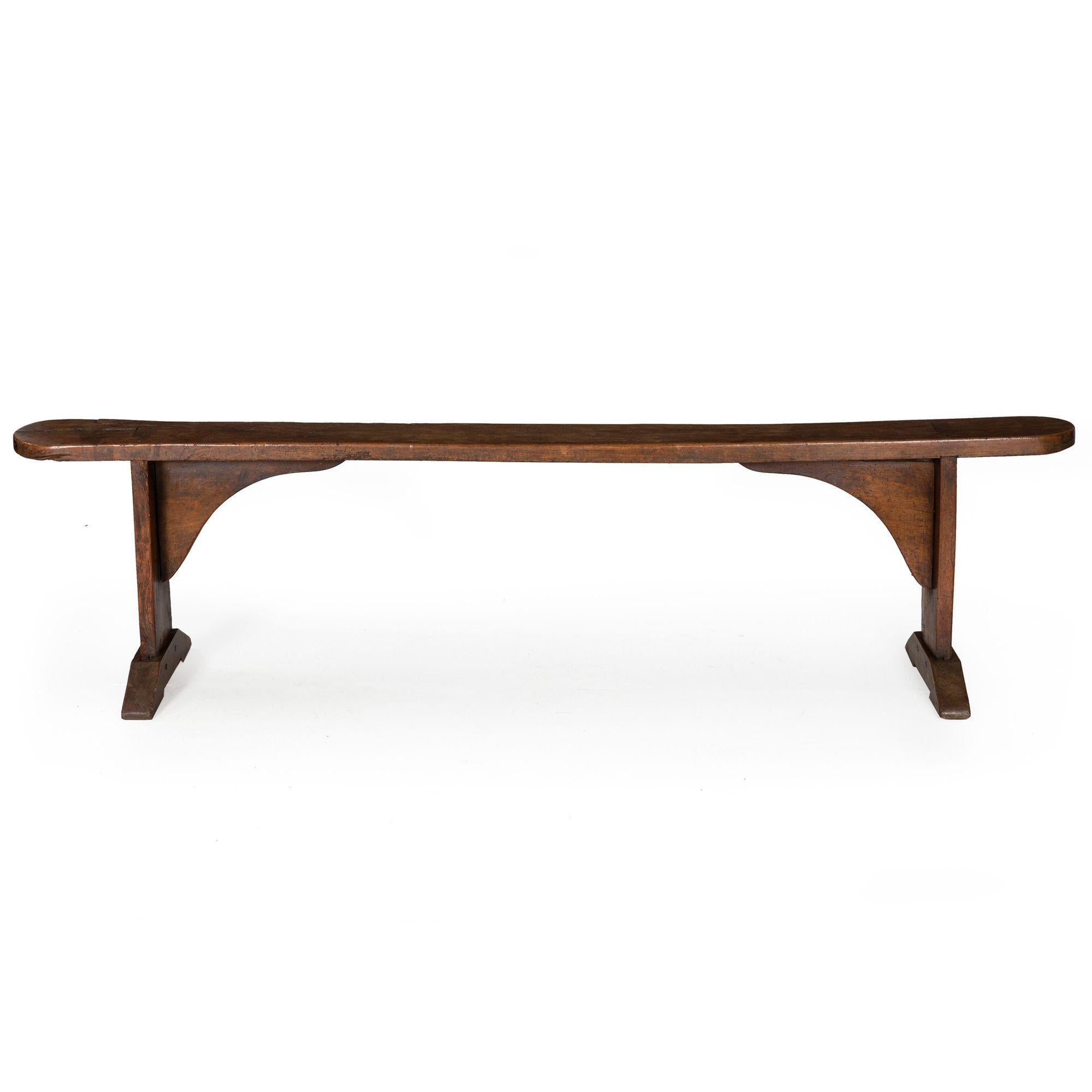 ENGLISH PATINATED ELM LONG TRESTLE BENCH
Two available  Circa 1750 with restorations
Item # 305TBP10L-1 

An incredibly beautiful bench, we acquired this as part of a pair (the other possibly still available in our inventory under item #