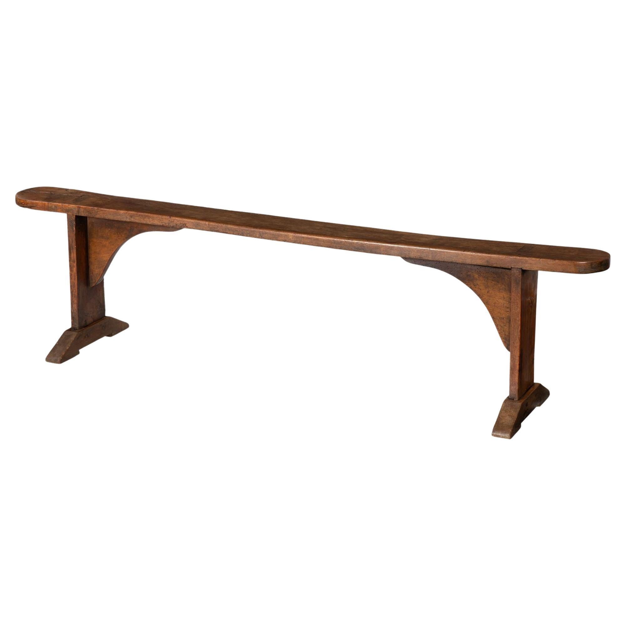 Mid-18th Century English Patinated Elm Long Trestle Bench For Sale