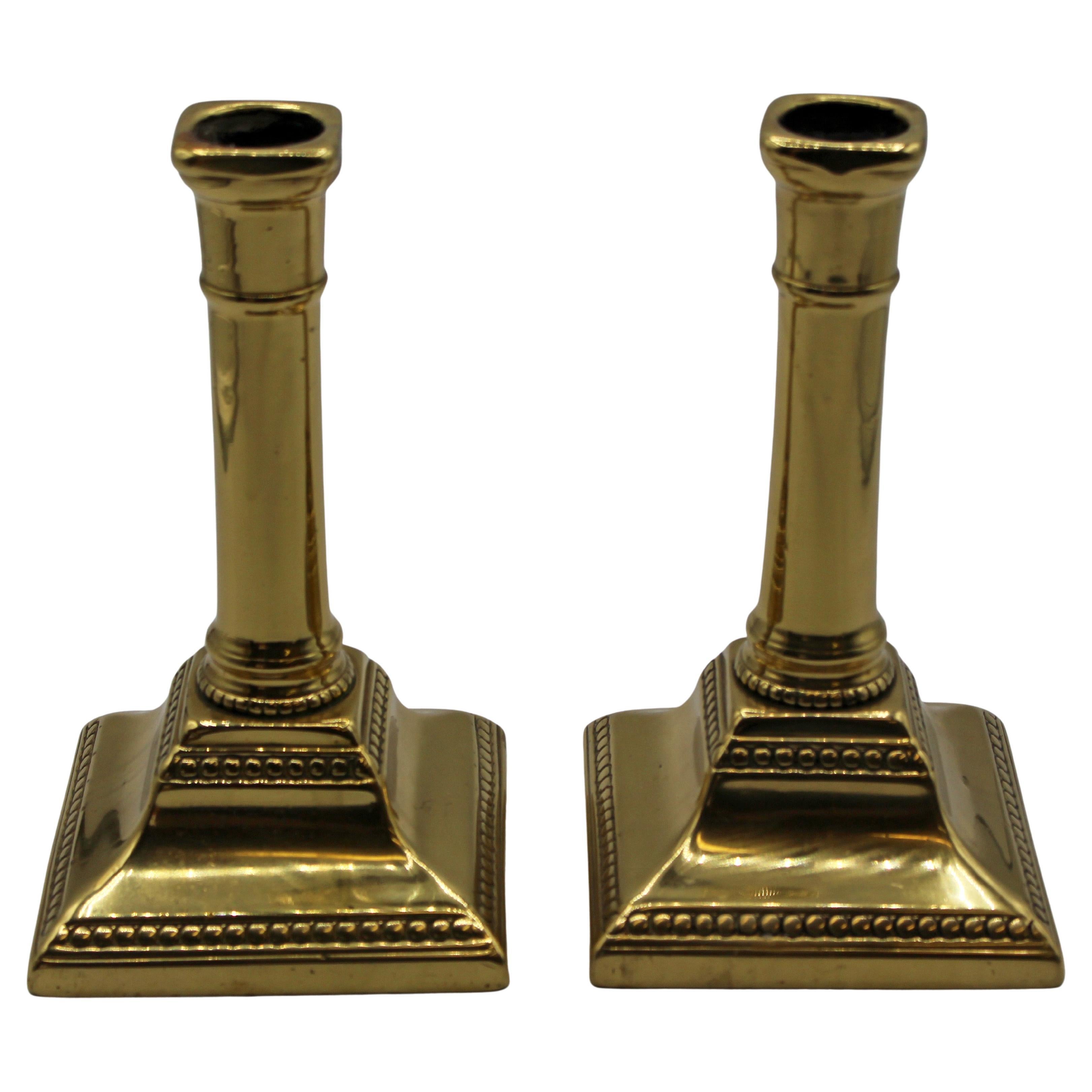 Mid-18th Century English Queen Anne Pair of Brass Candlesticks For Sale