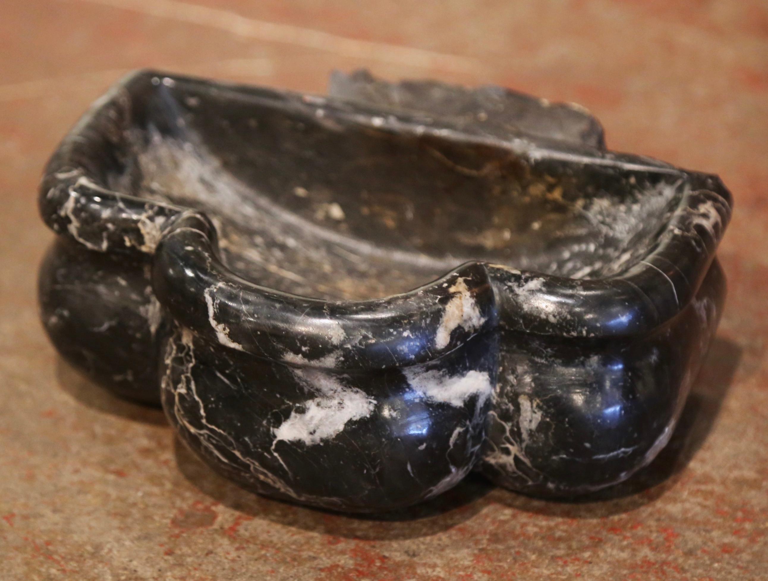 This antique dish with shell form was carved in France, circa 1760. Originally at the entrance door of a private chapel, this stoup was inserted in the wall and used to hold the holy water. The black and grey marble church recipient is in excellent