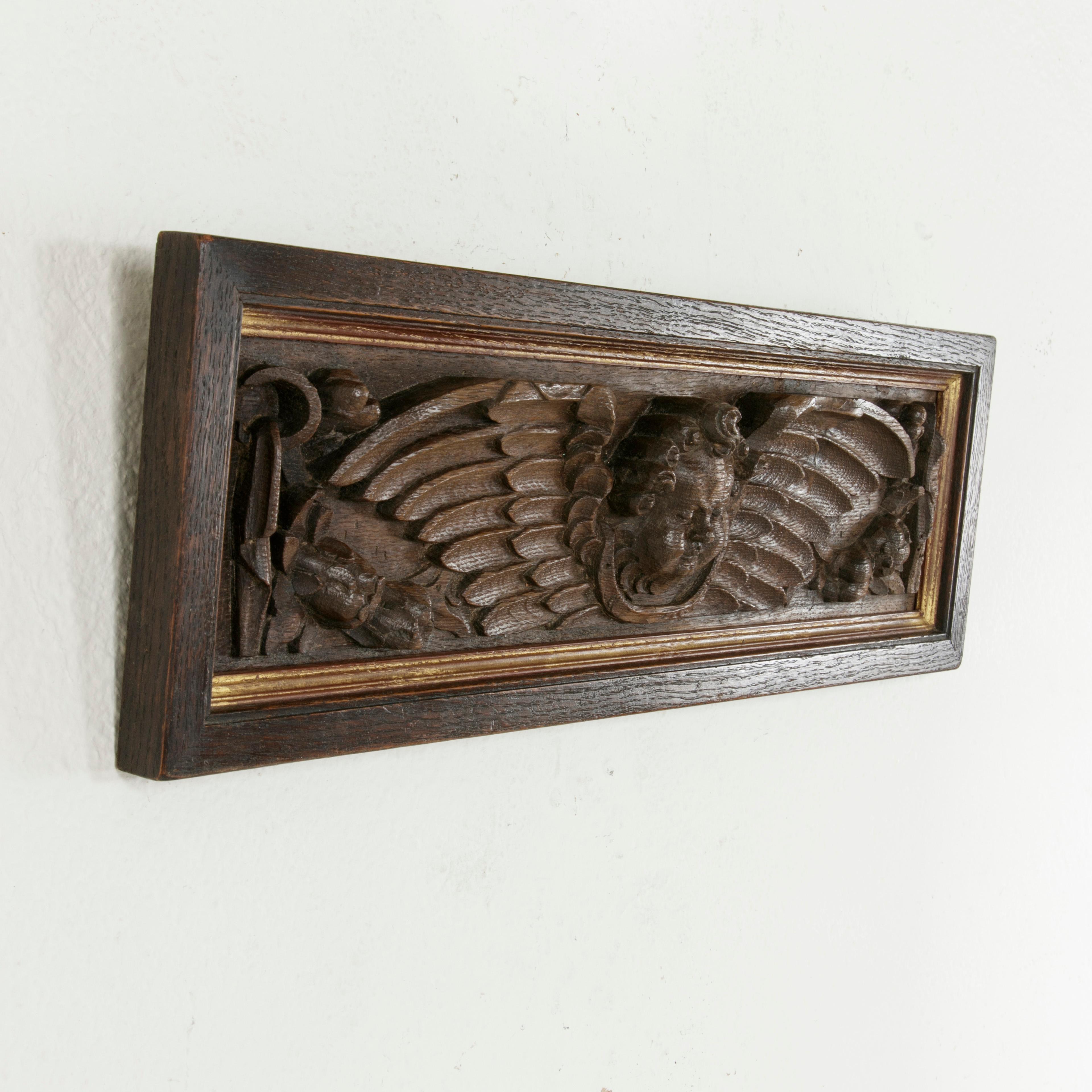 Hand-Carved Mid-18th Century French Framed Hand Carved Oak Panel with Angel and Gilt Details