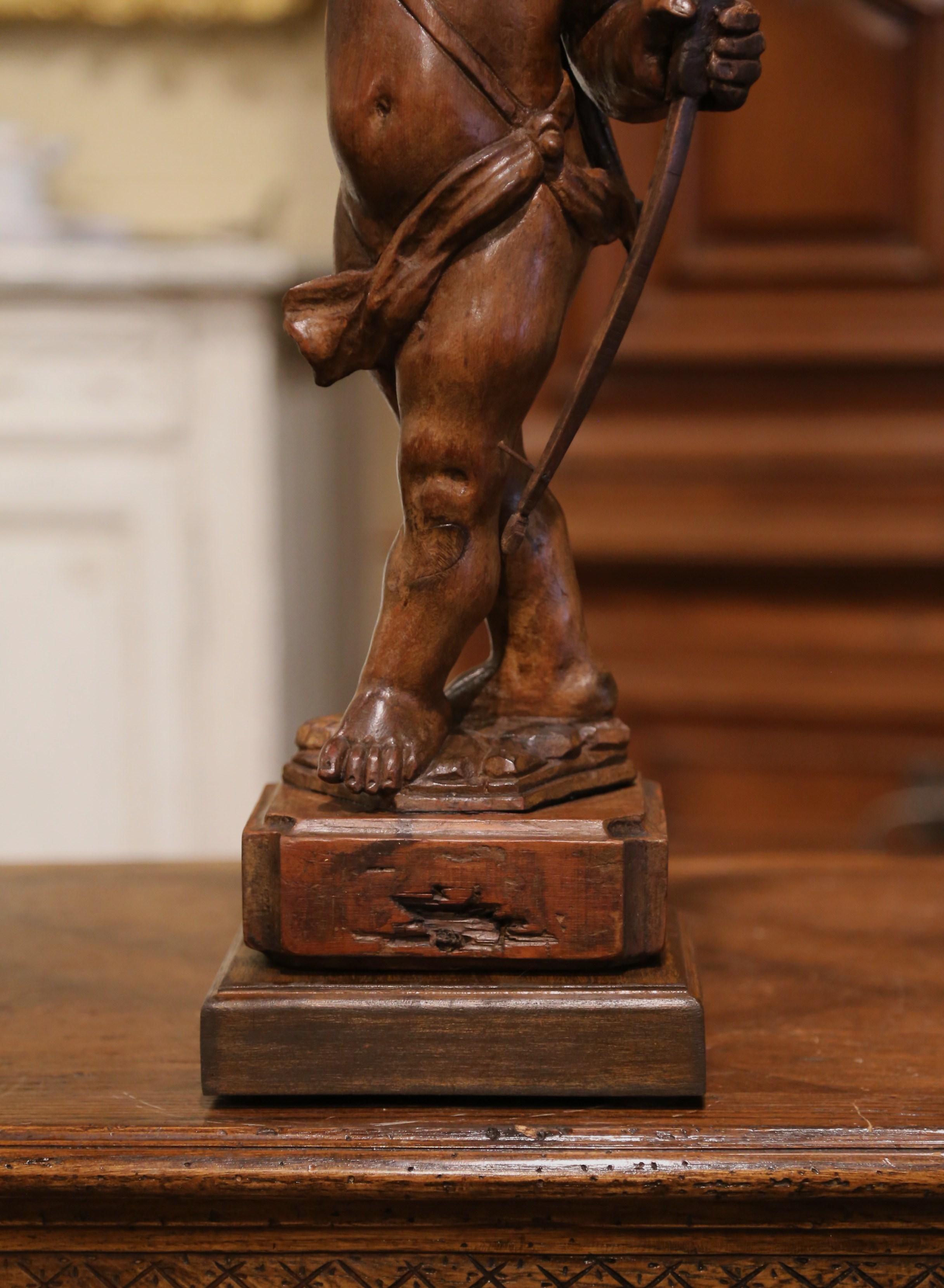 Hand-Carved Mid-18th Century French Hand Carved Walnut Cherub Sculpture with Bow and Arrows