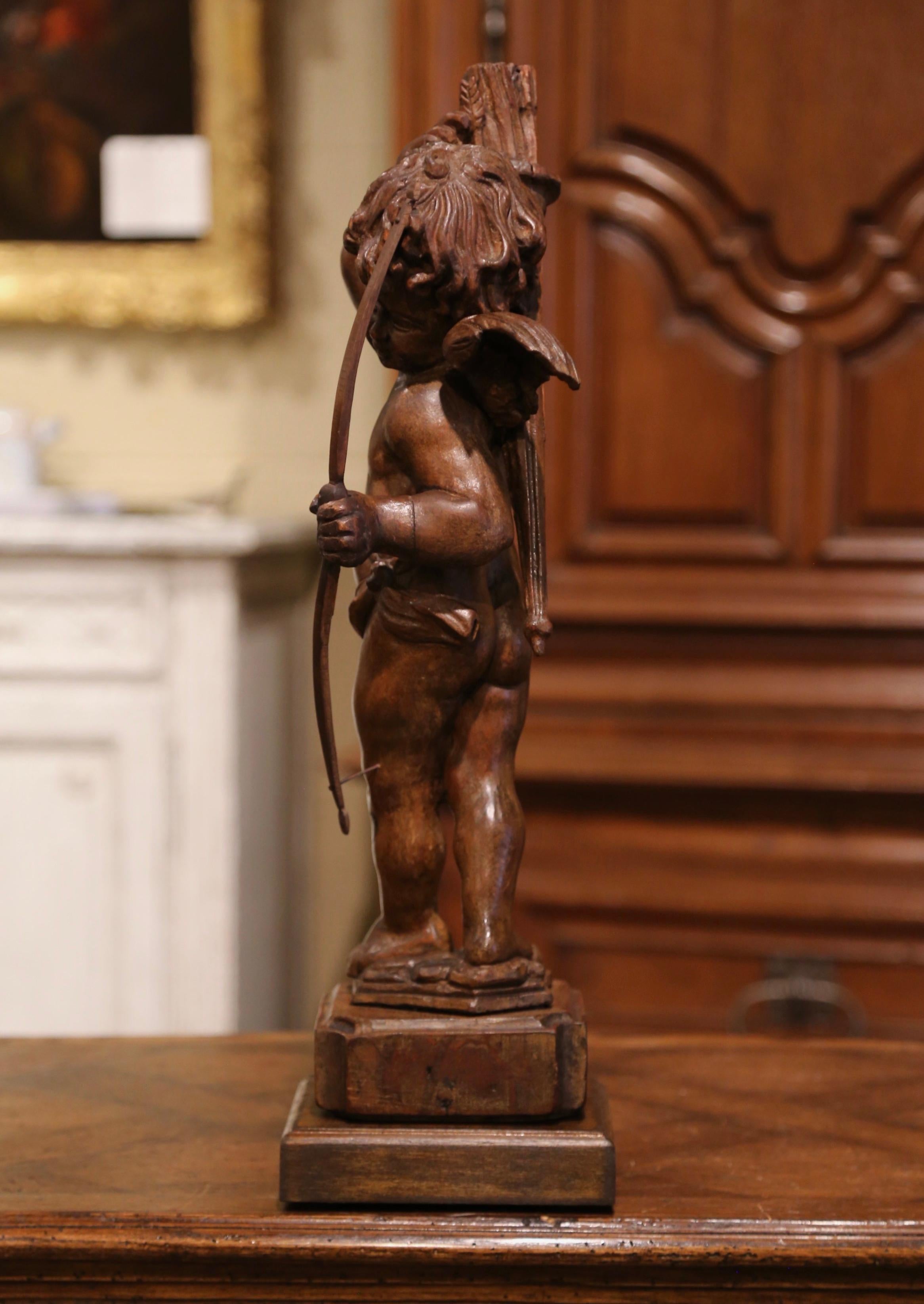 Mid-18th Century French Hand Carved Walnut Cherub Sculpture with Bow and Arrows 1