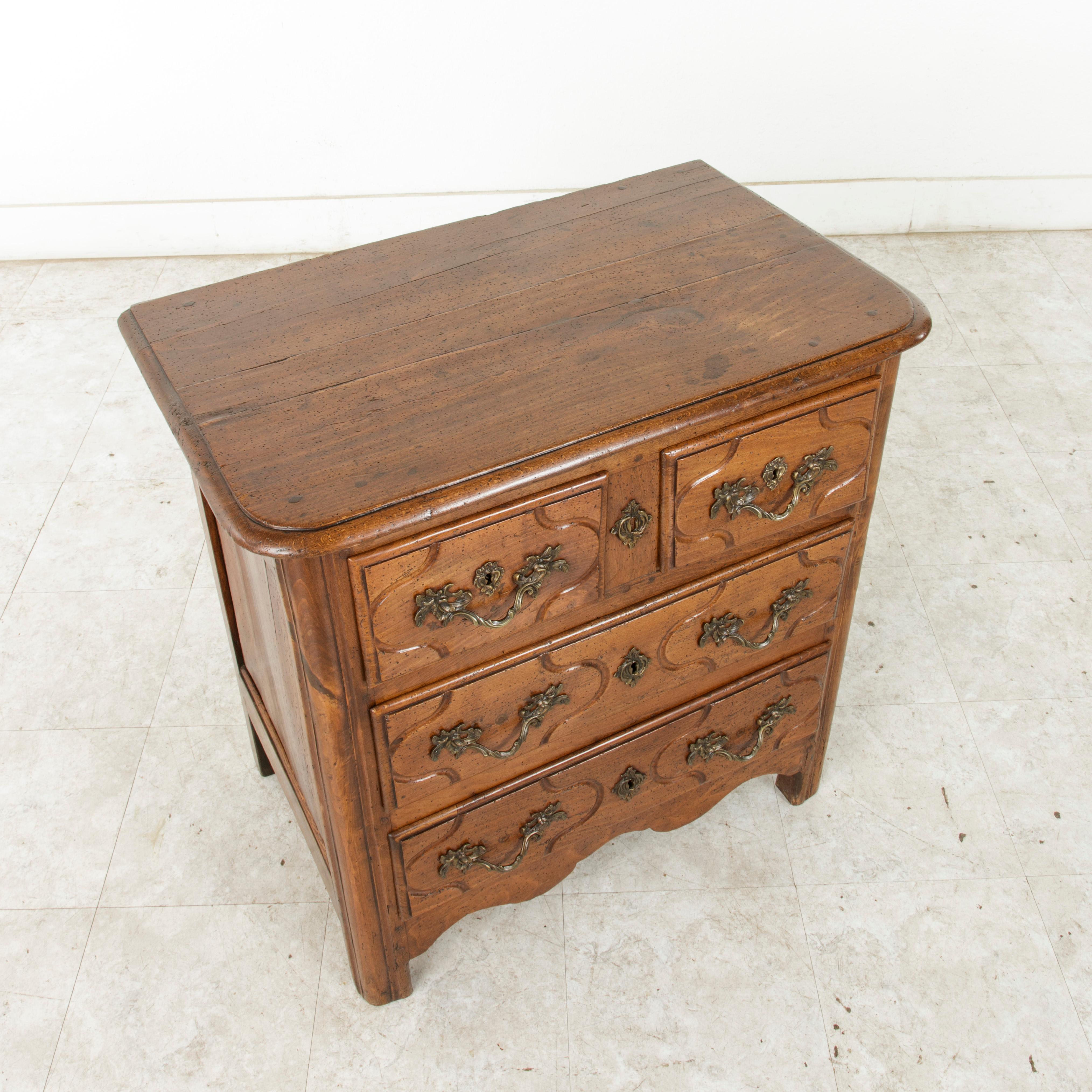 Mid-18th Century French Louis XIV Period Hand Carved Chestnut Commode or Chest 4