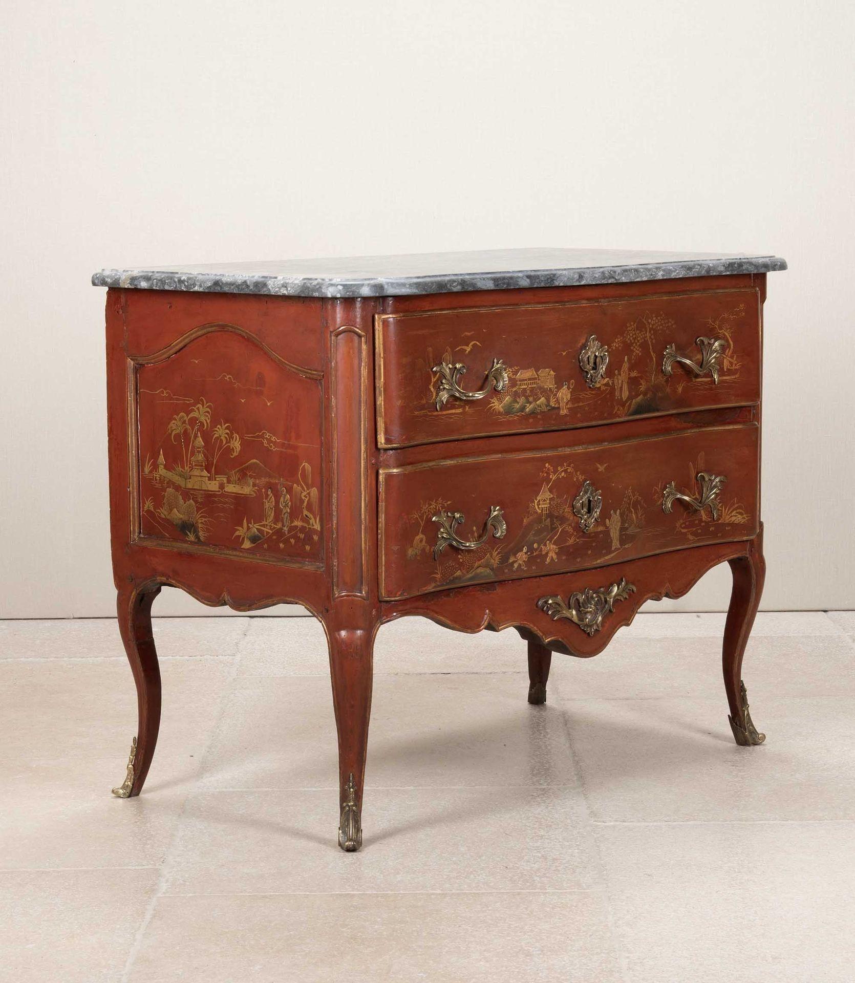 Beautiful mid-18th Century Louis XV Vernis Martin red lacquer two drawer commode. 
Decorated with Chinoiserie scenes and complete with original grey fossil marble top.
Circa 1750.